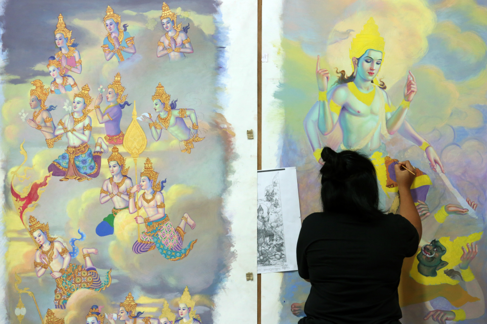 Decorative Royal Cremation panels ‘guide the way to Heaven’