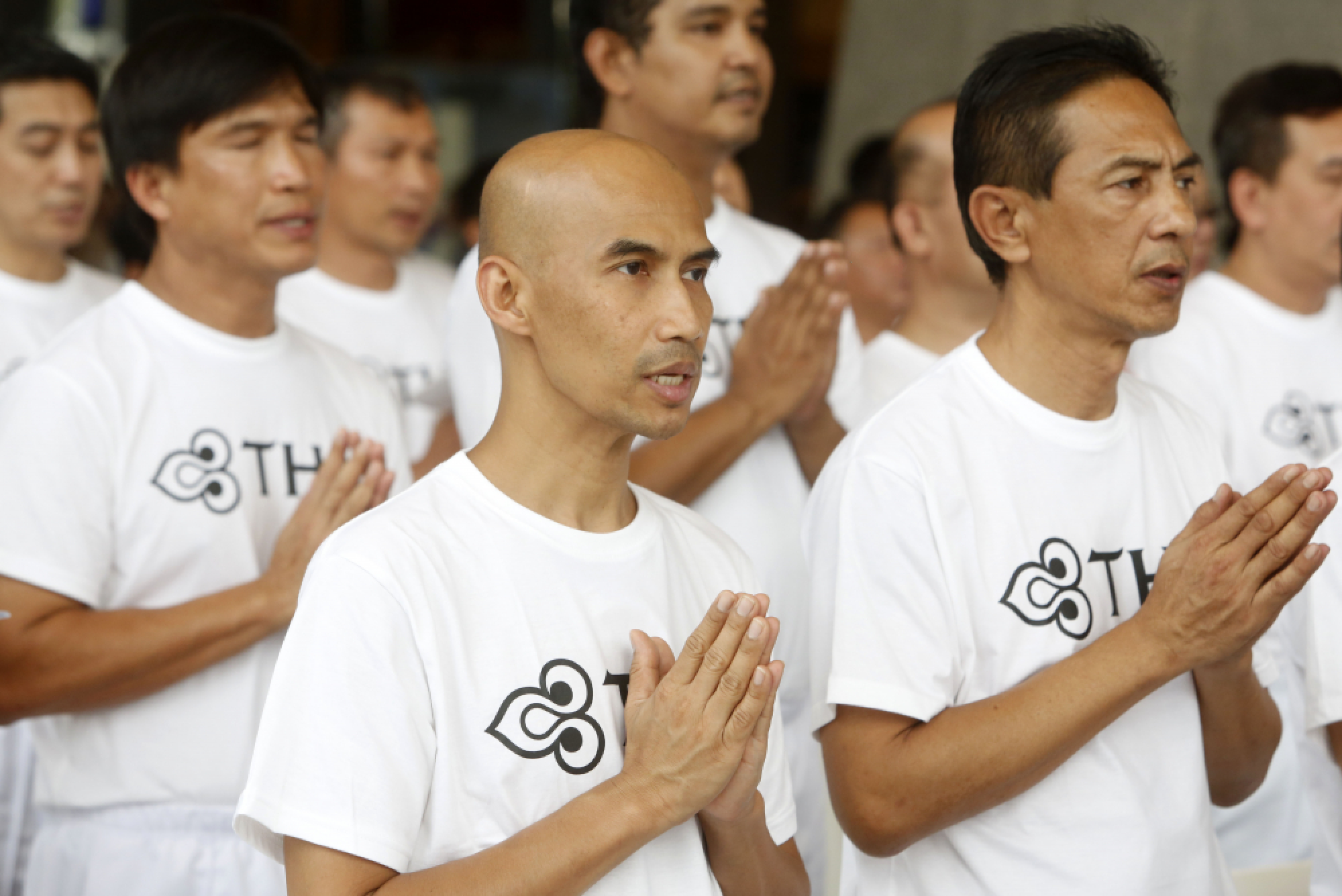 THAI employees ordained in honour of King
