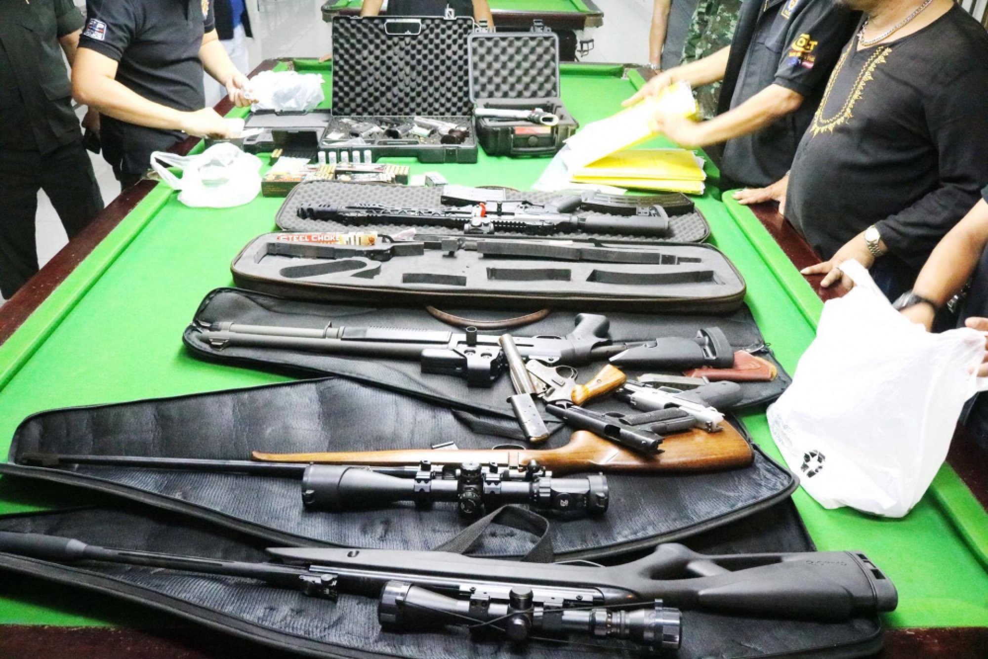 Guns, loan contracts seized in snooker club raid