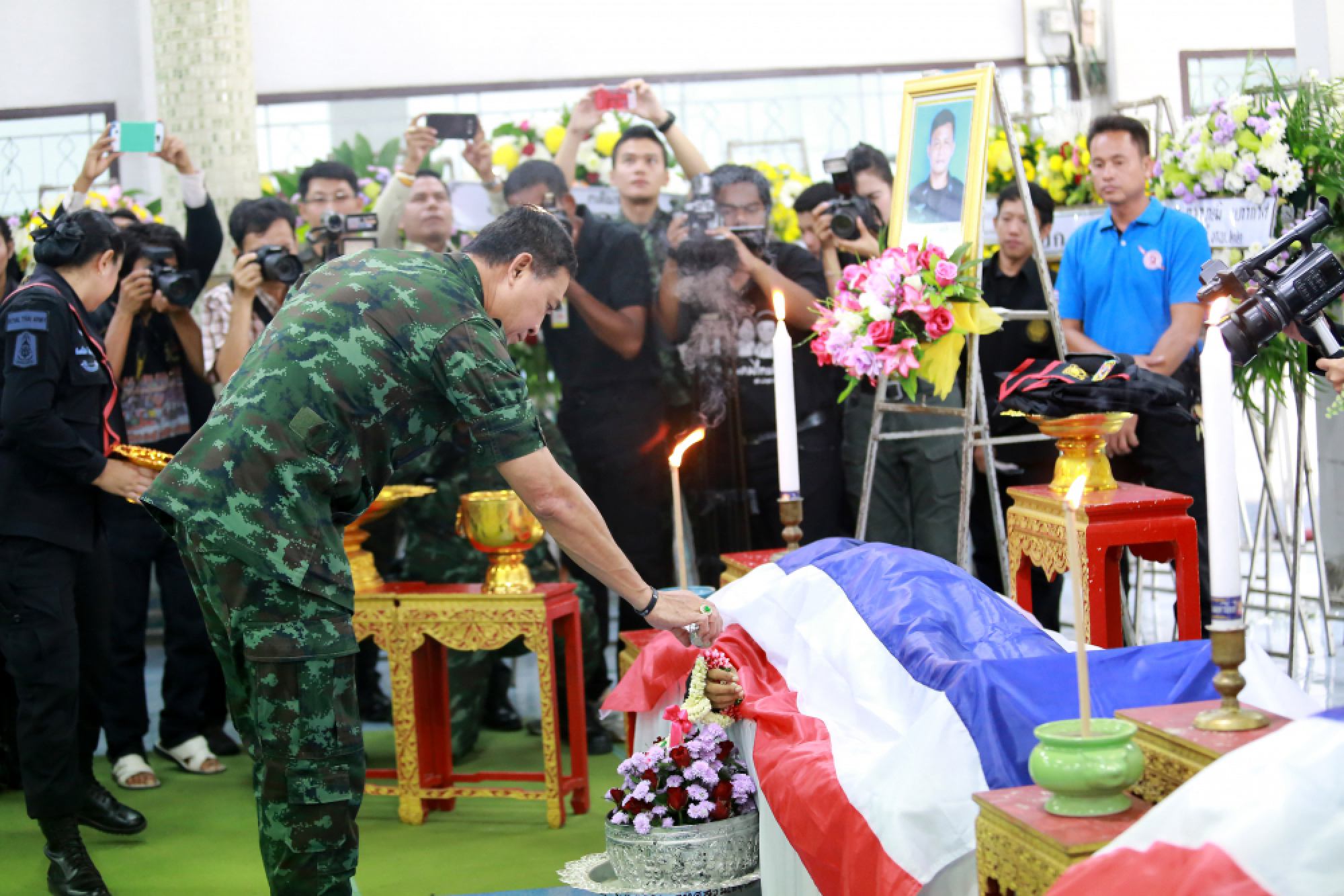 Families torn by bombing deaths of officers