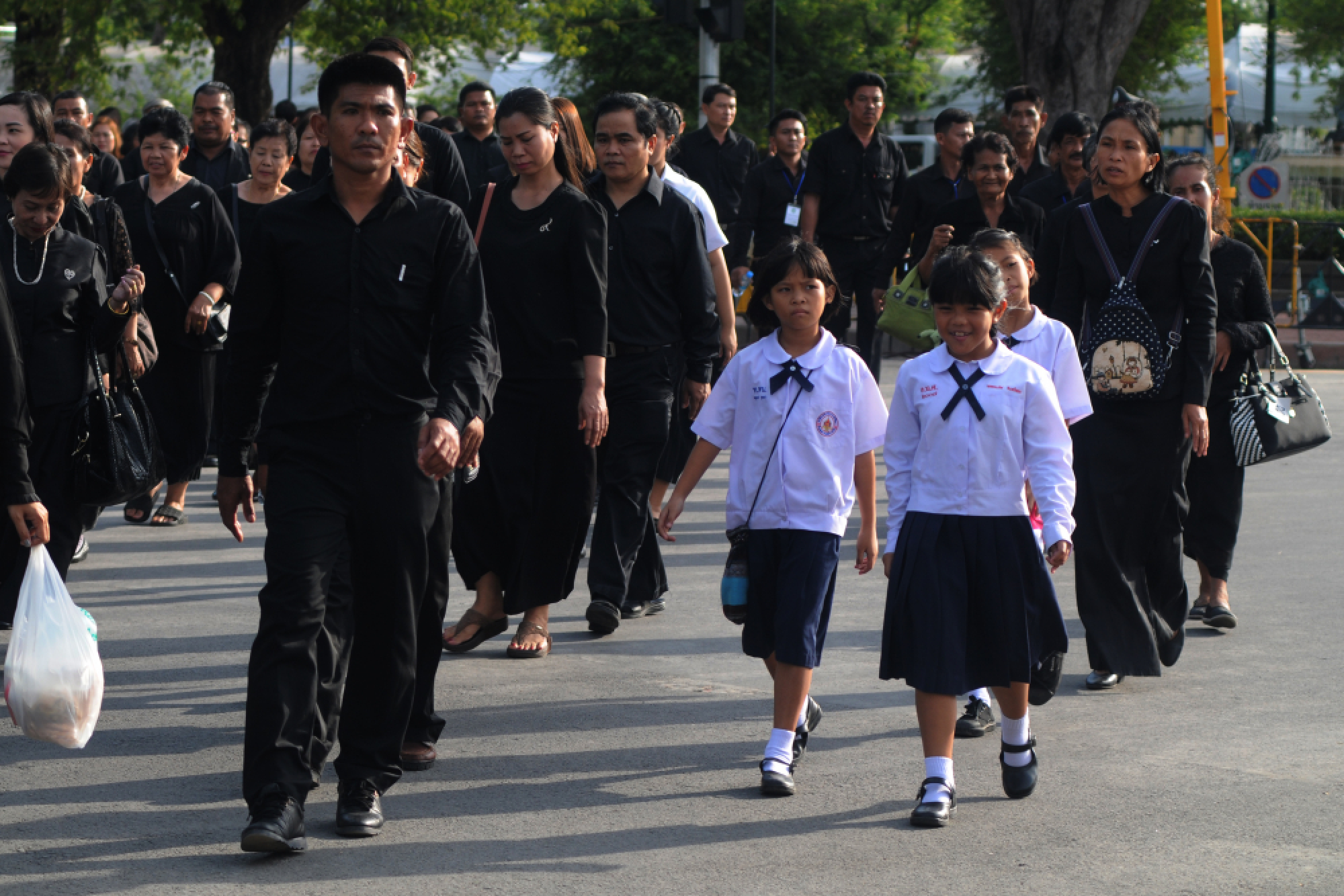 Cyclists head to Sanam Luang to pay respects to late King