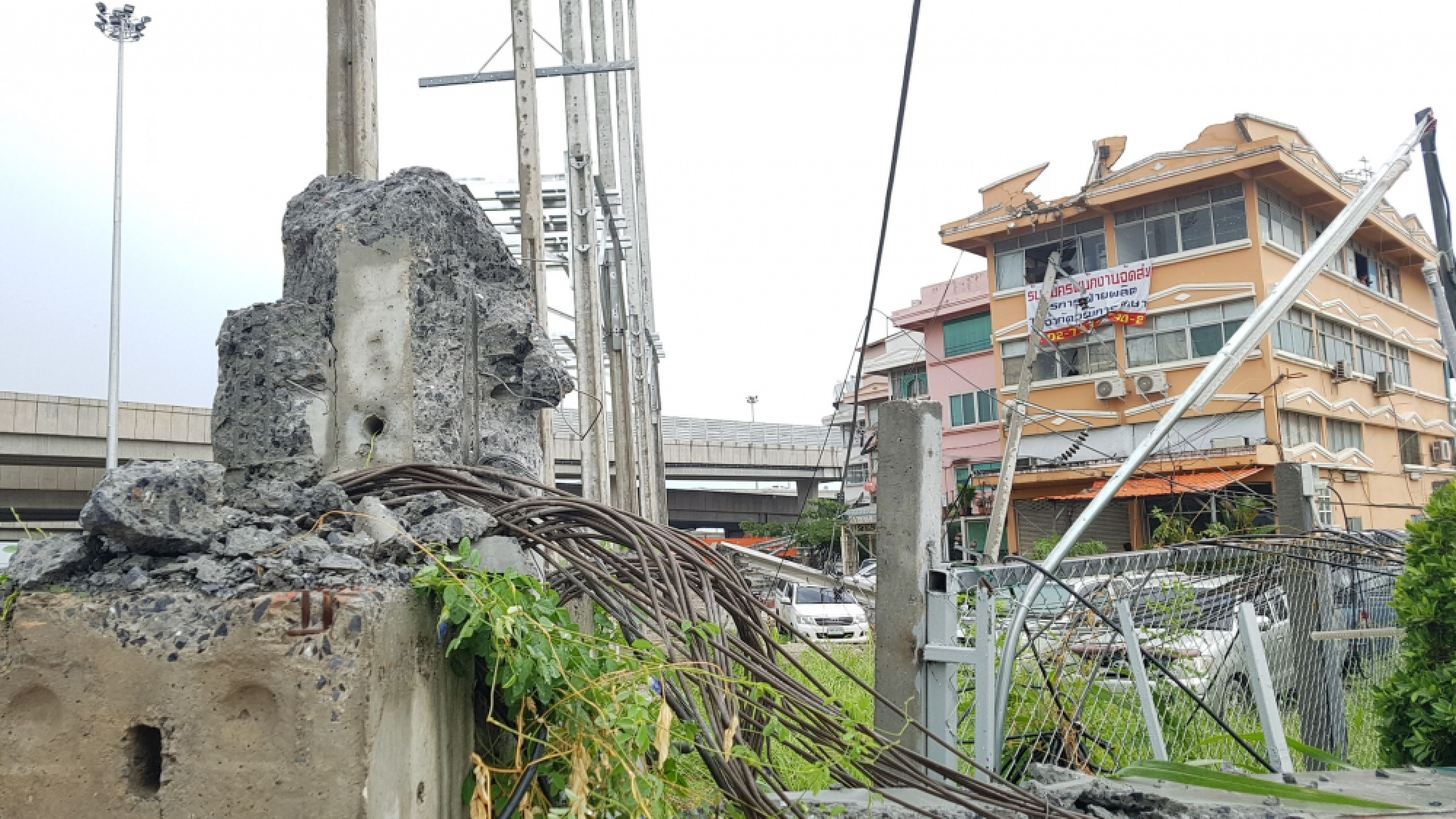 Storm topples 14 power poles in Lat Krabang