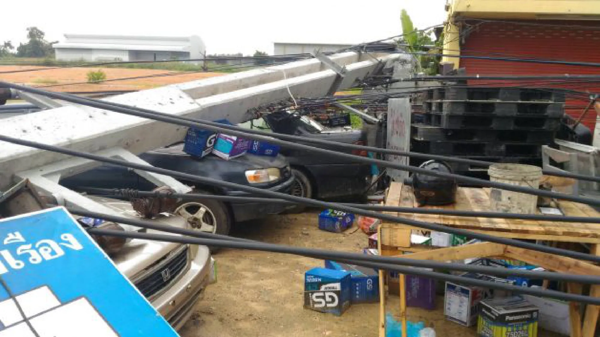 Storm topples 14 power poles in Lat Krabang