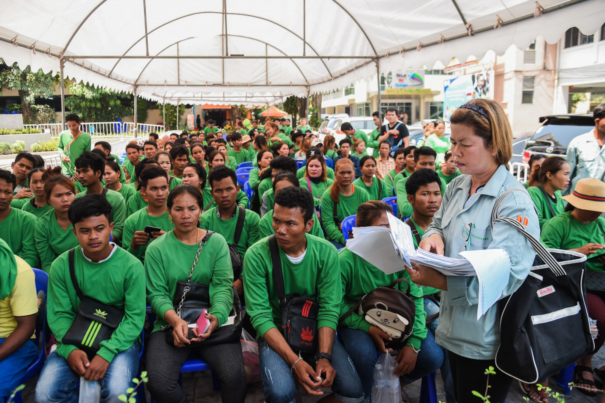 One-hour processing for migrants with papers, pledges Labour Minister