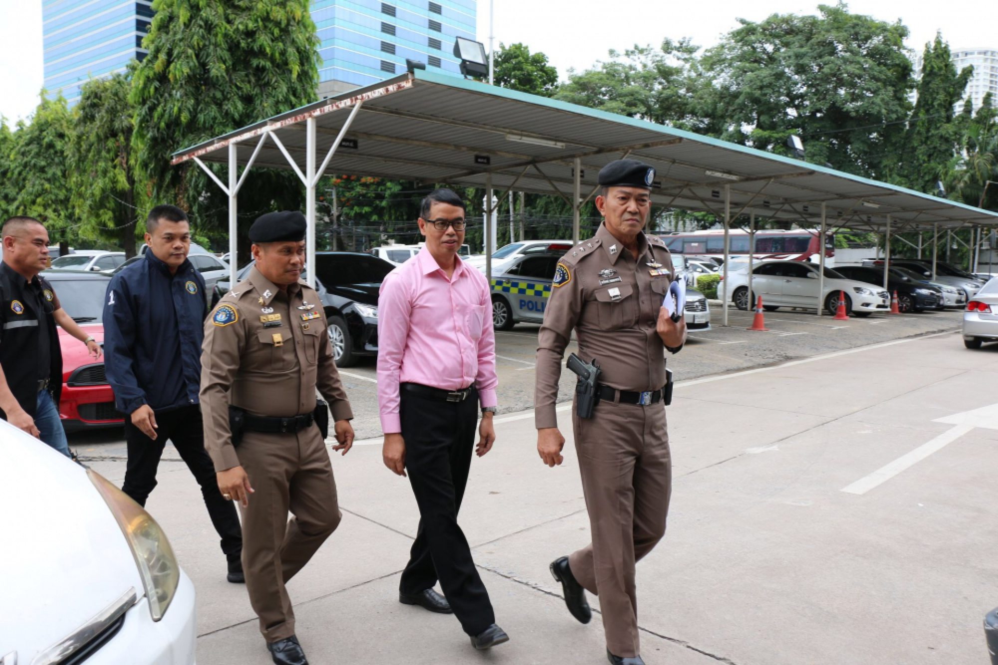 Nine suspects in temple funds scandal arrested