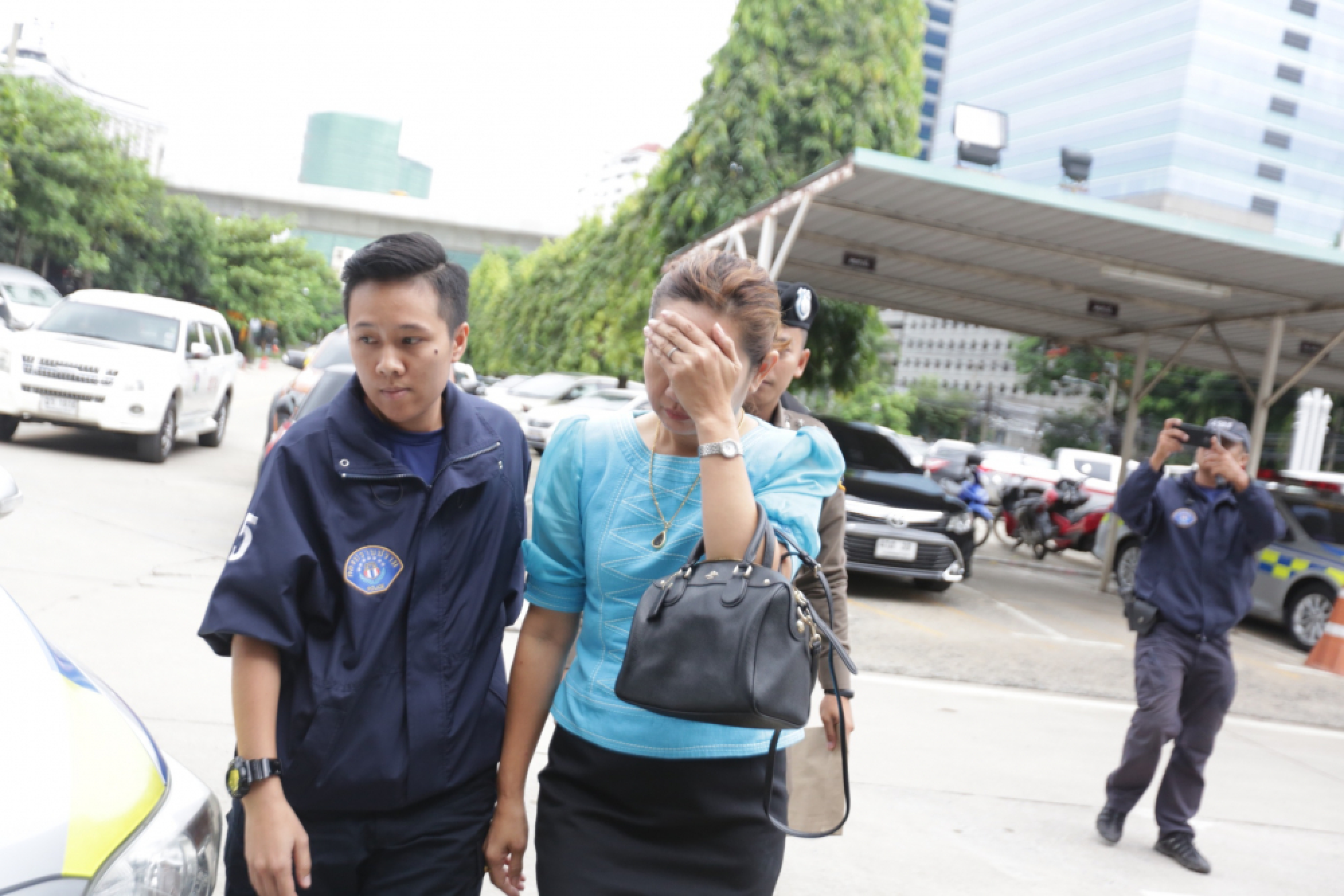 Nine suspects in temple funds scandal arrested