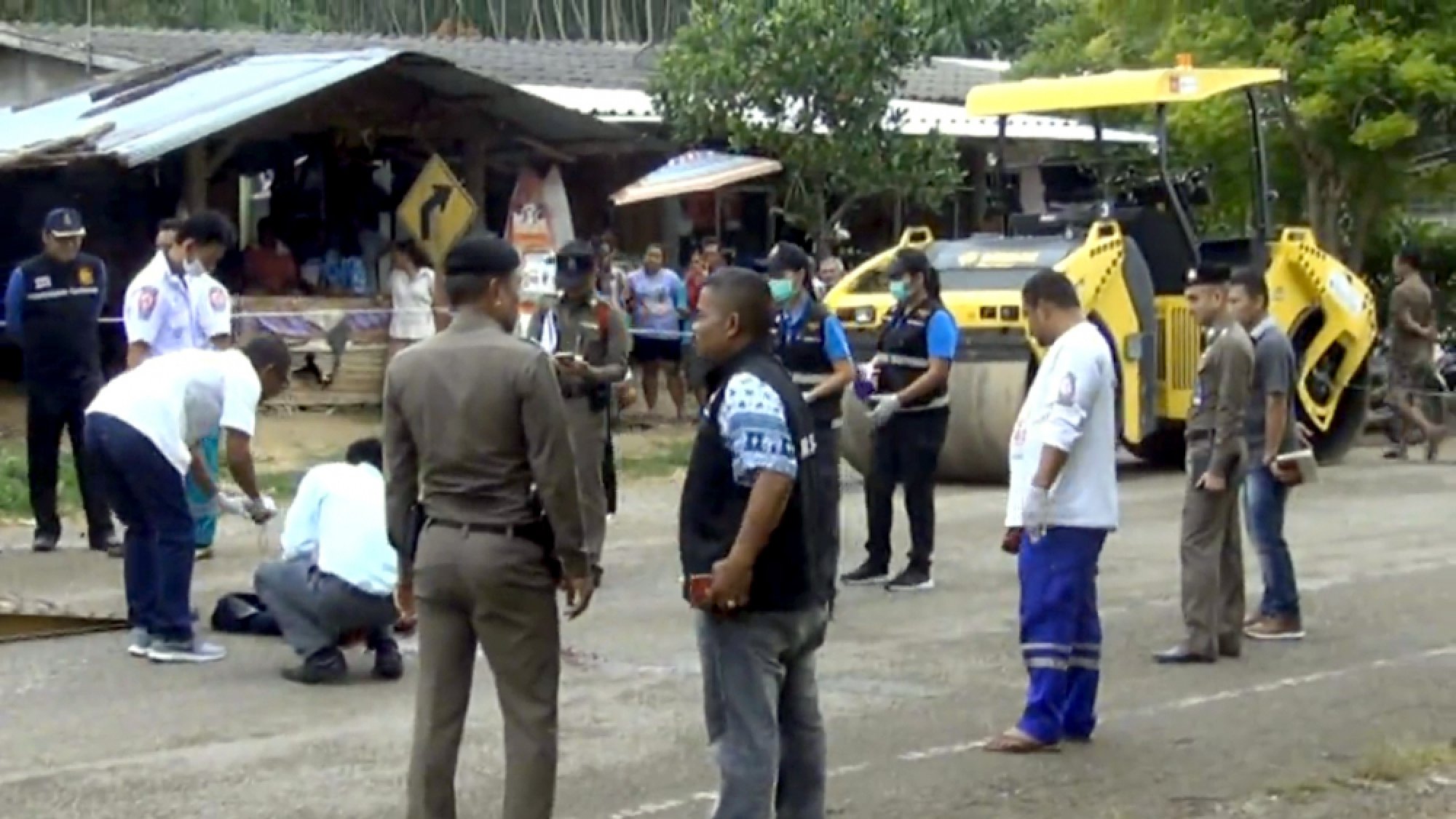 Trang road worker shot after arson attacks
