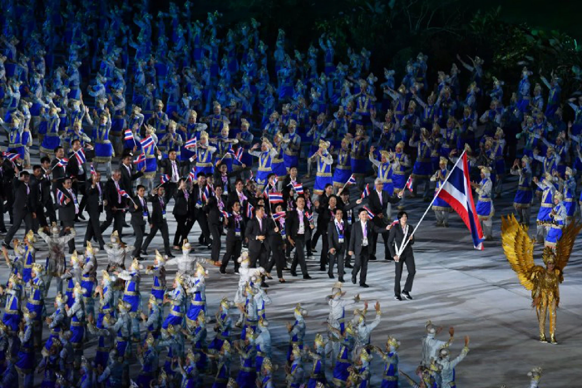 Two Koreas march together as Asian Games burst into life