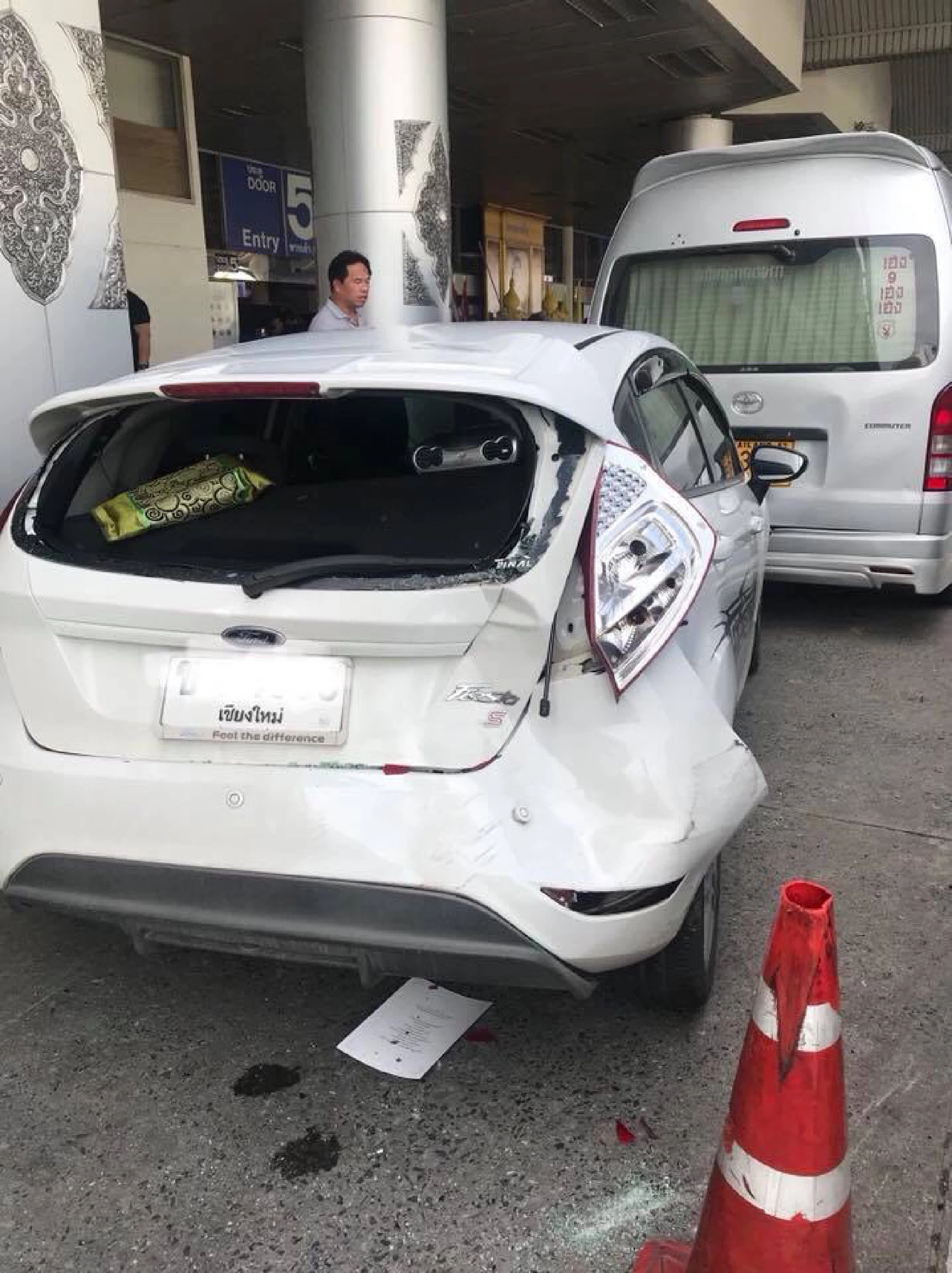 Woman drives into security officer, forgets all about it