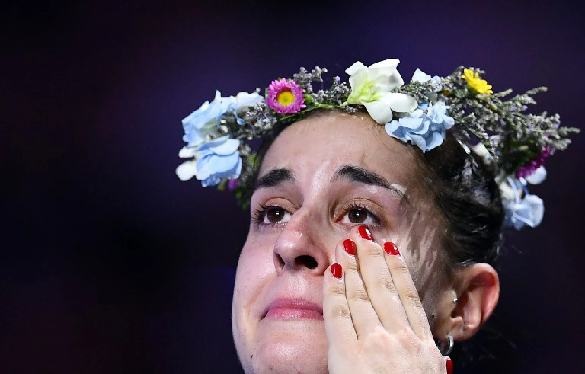 Marin makes history with third badminton world title