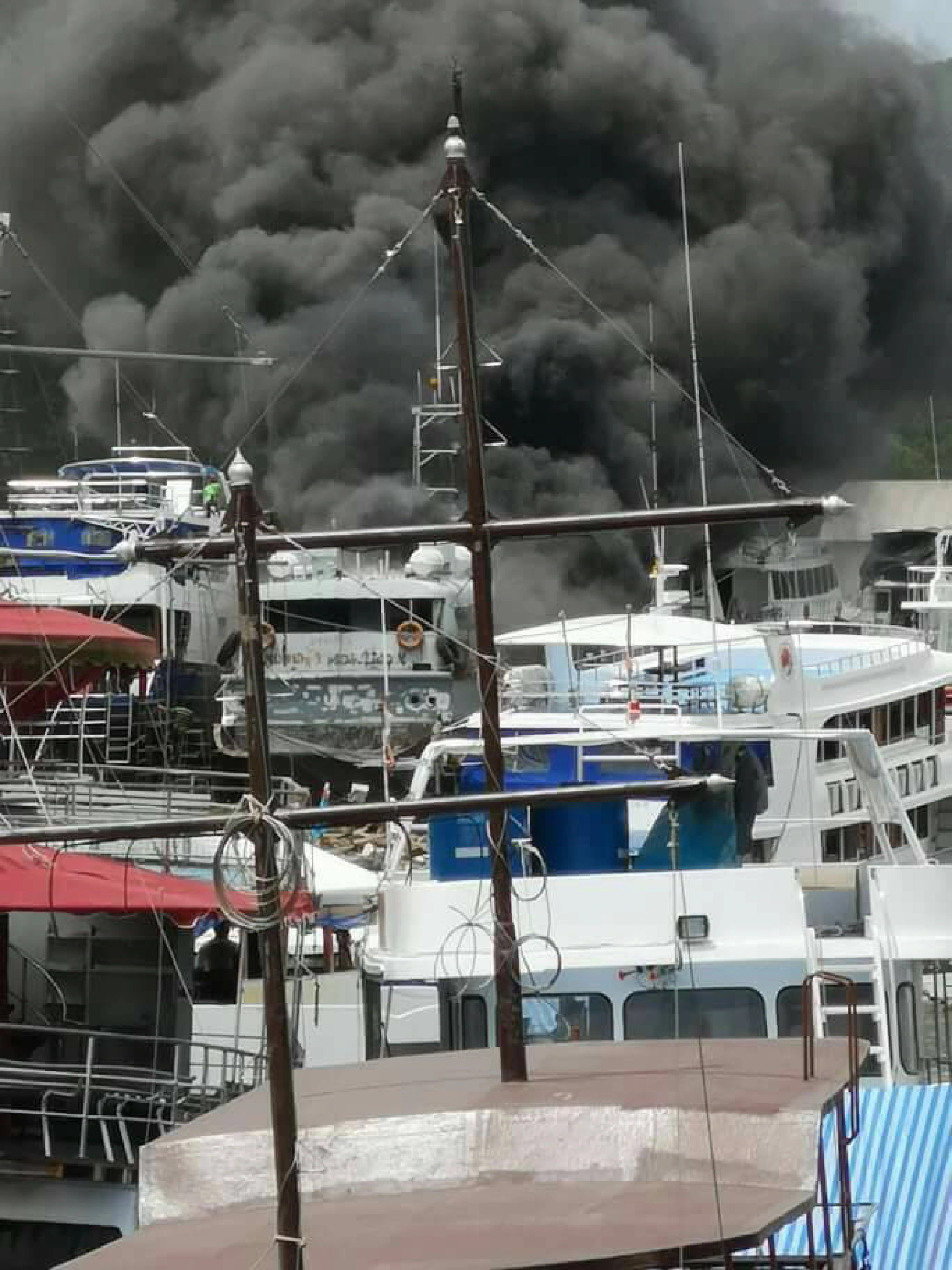 Boat at catches fire at Phuket pier