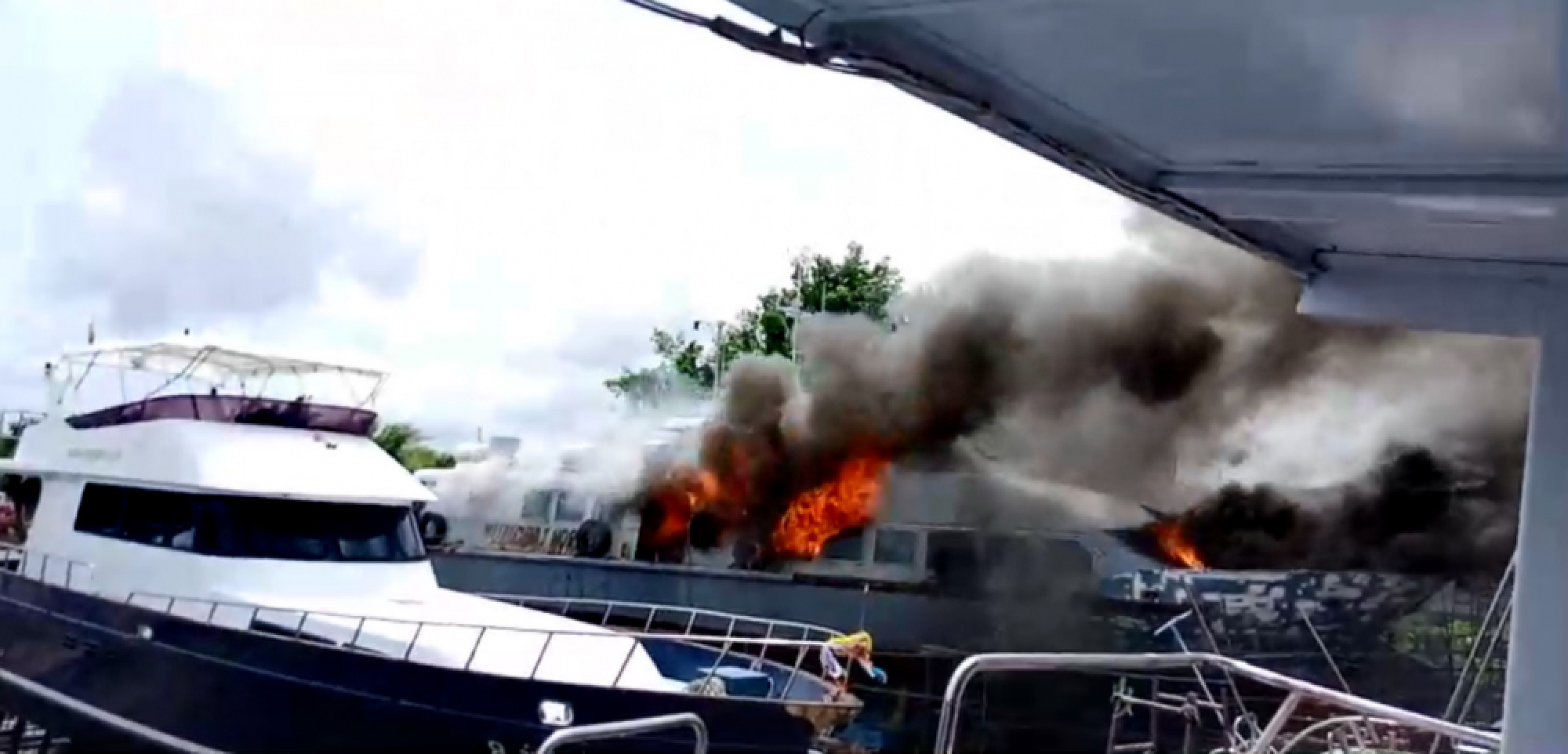 Boat at catches fire at Phuket pier