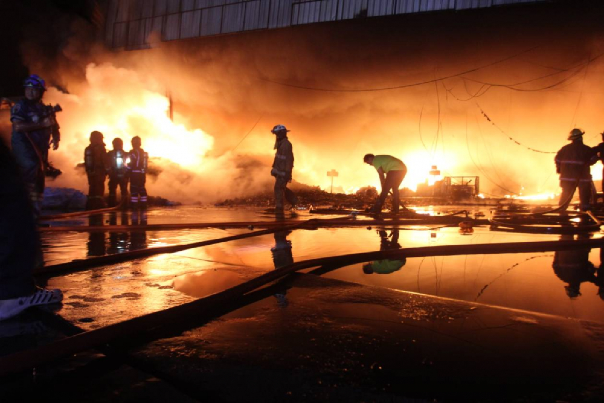 Bangkok recycling plant gutted in stubborn fire