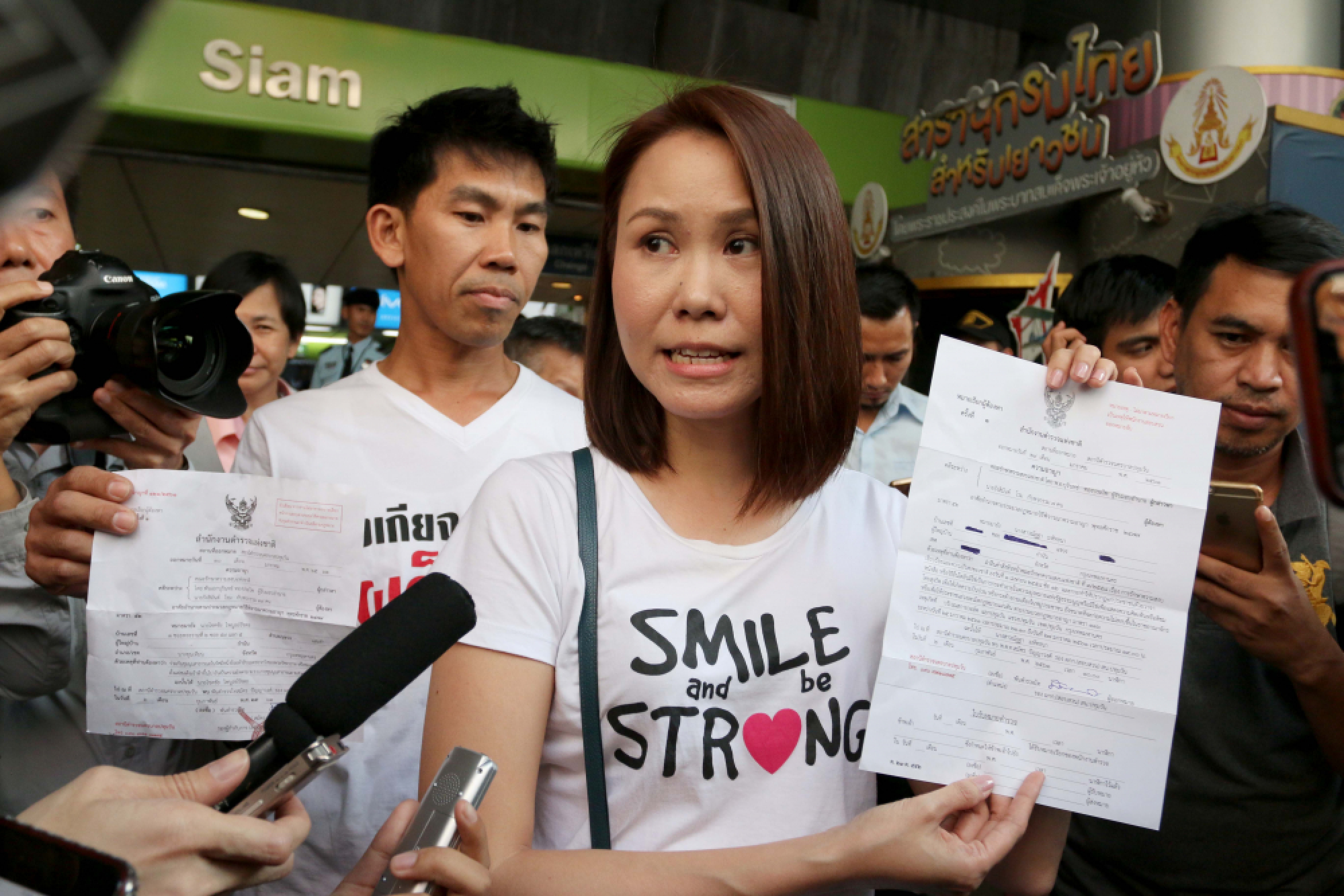 Defiant activists hold silent poll delay protest