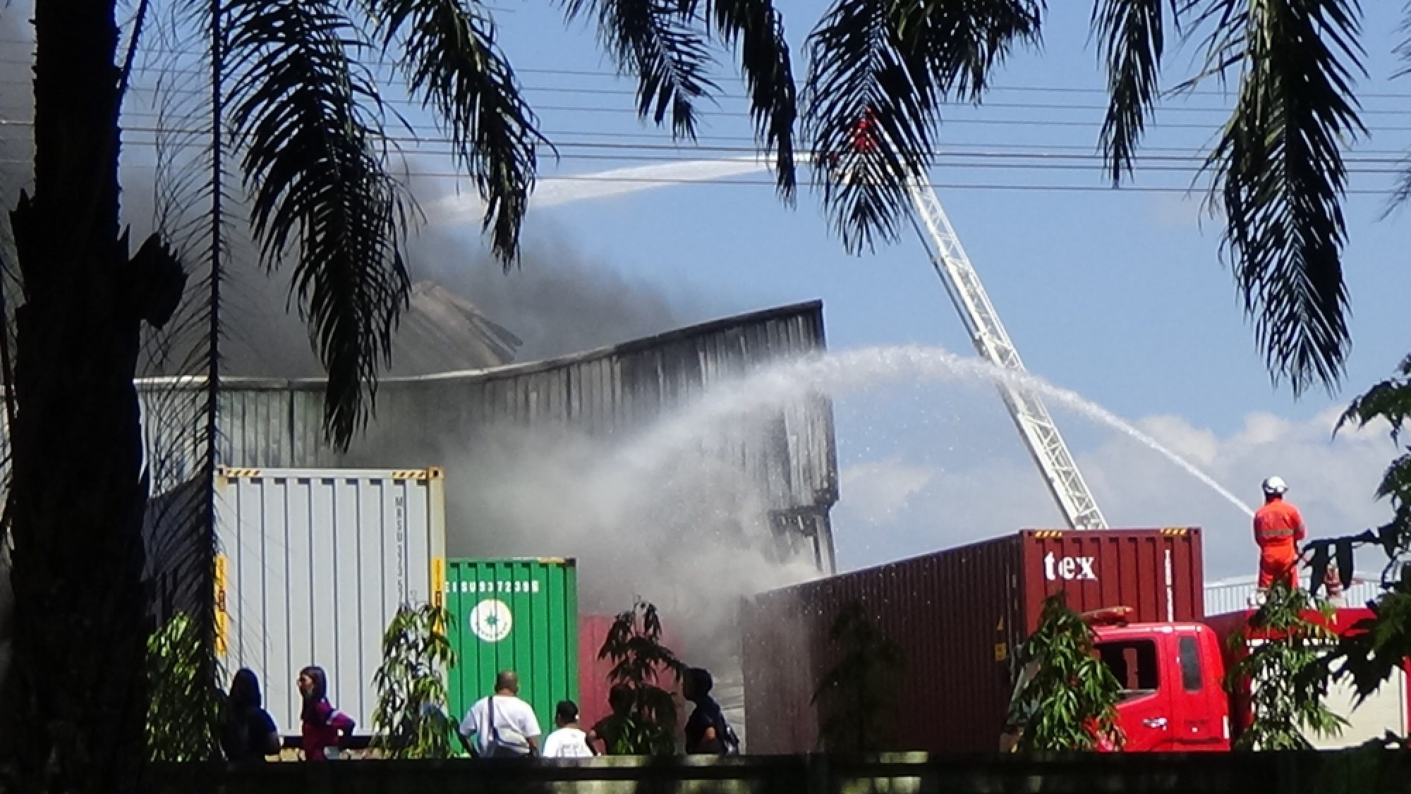 Thick smoke visible for kilometres as massive factory burns