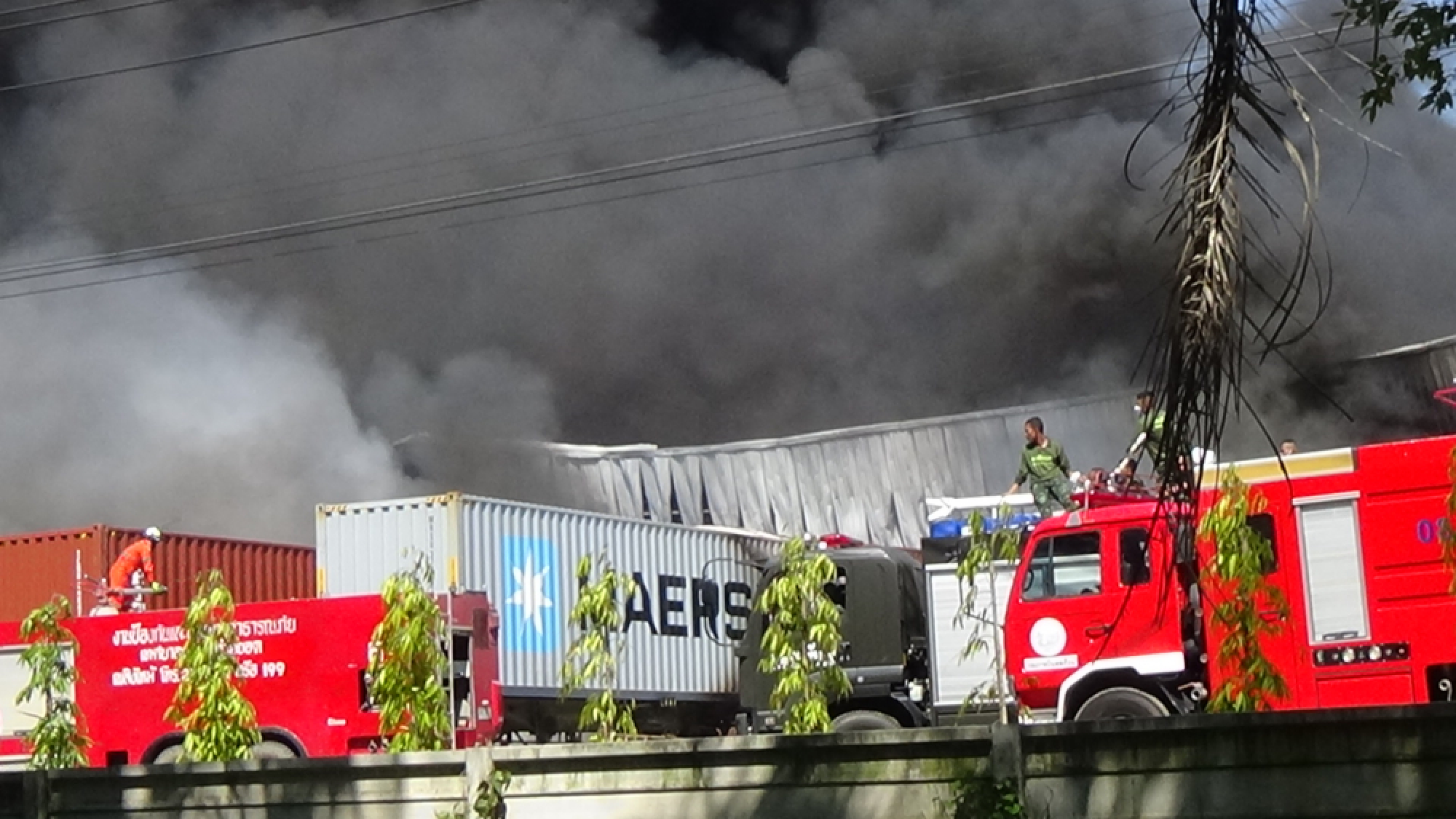 Thick smoke visible for kilometres as massive factory burns