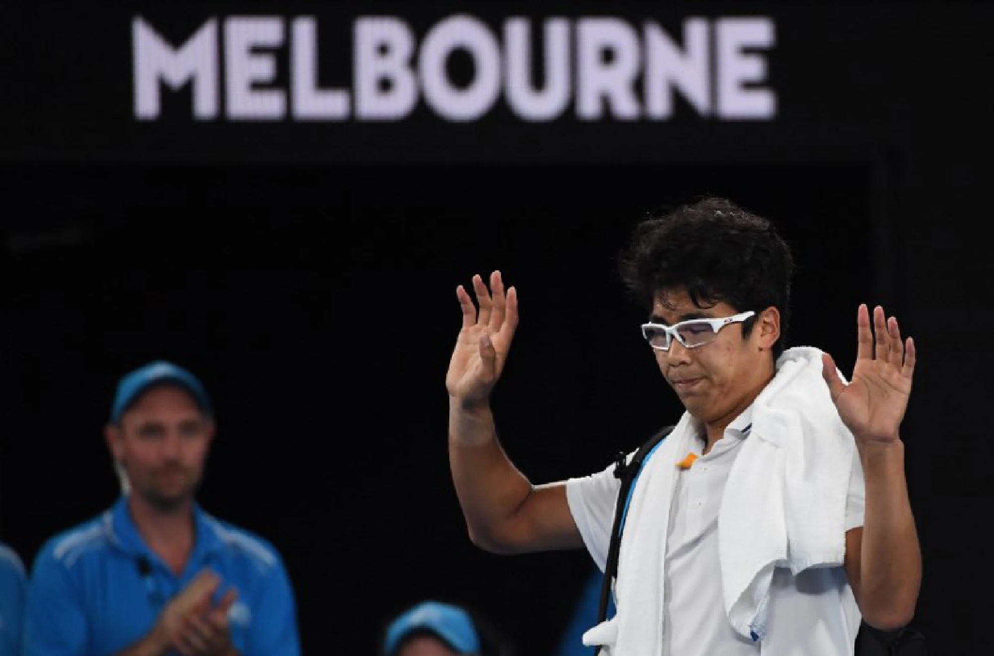 Federer into Open final as Chung retires injured