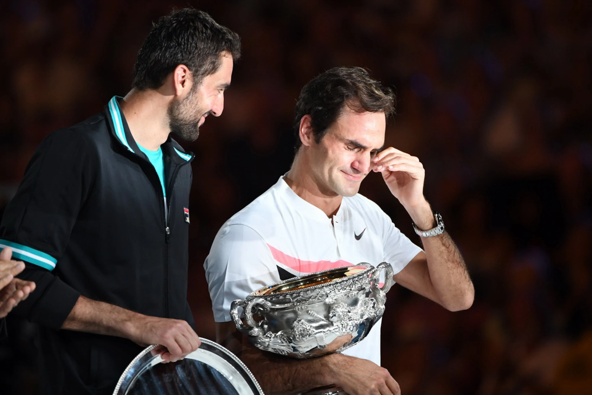 Tearful Federer wins Australian Open for 20th Slam title