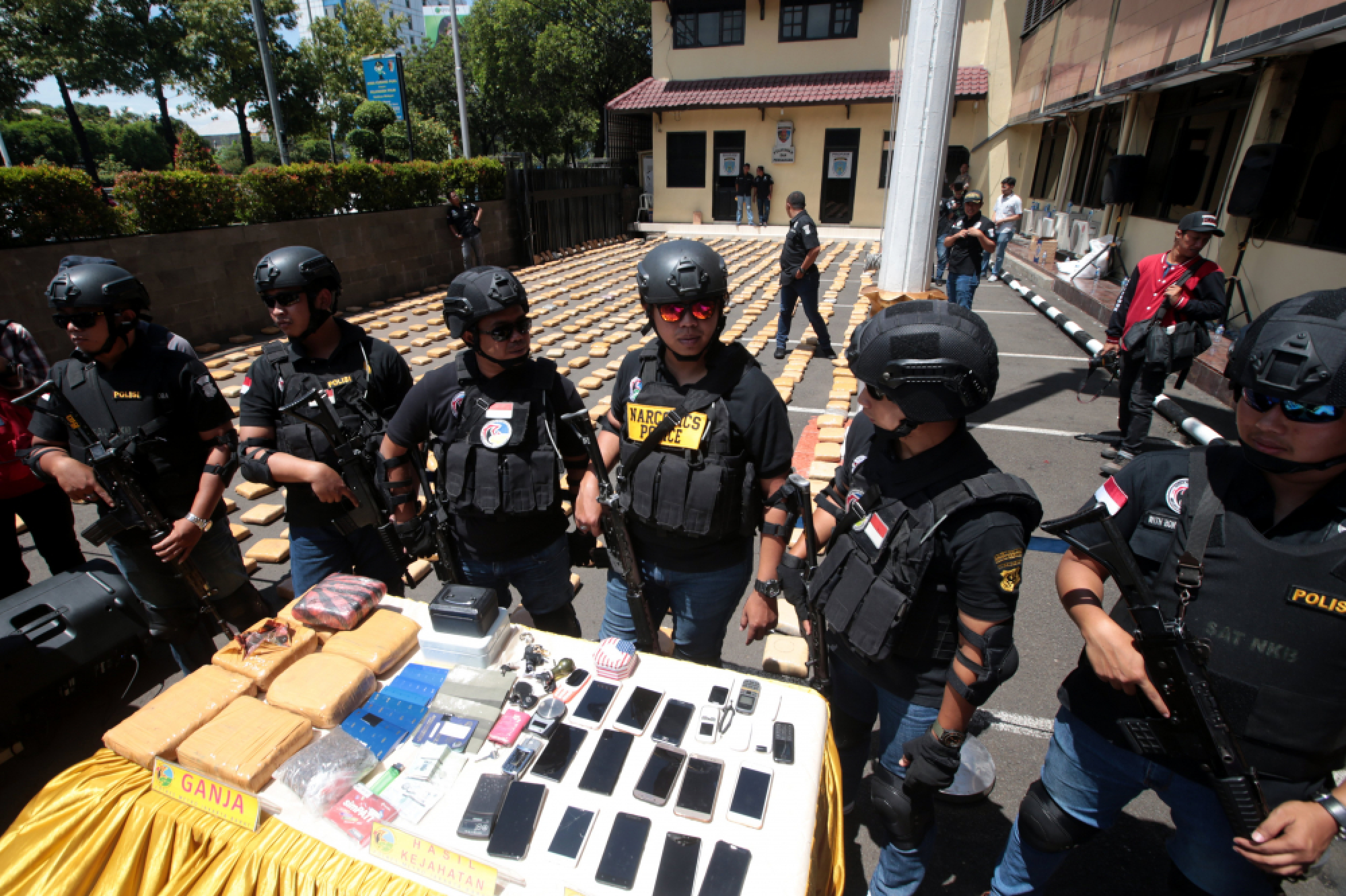 Indonesian police officers display 1.3 tons of cannabis in cannabis