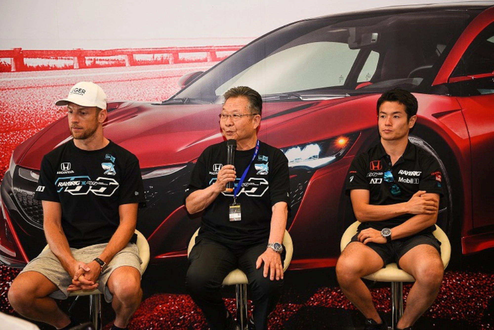 Button and Yamamoto meet local media