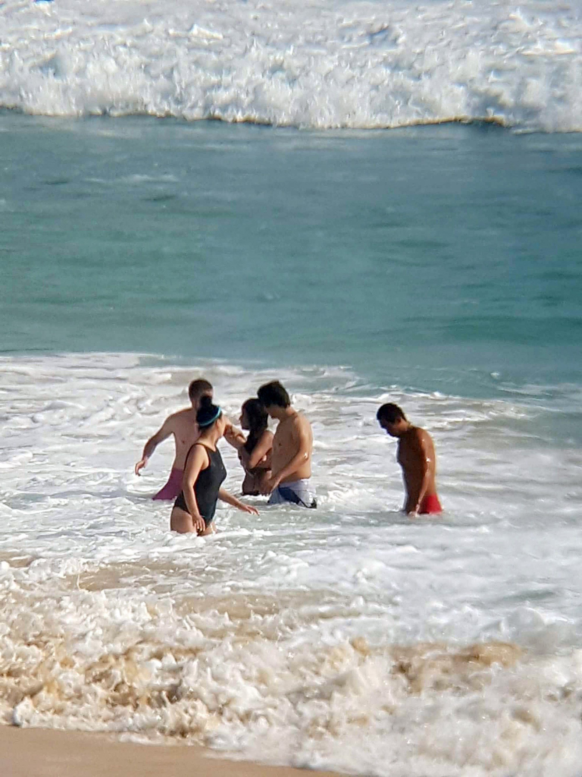 18 saved from Nai Harn surf