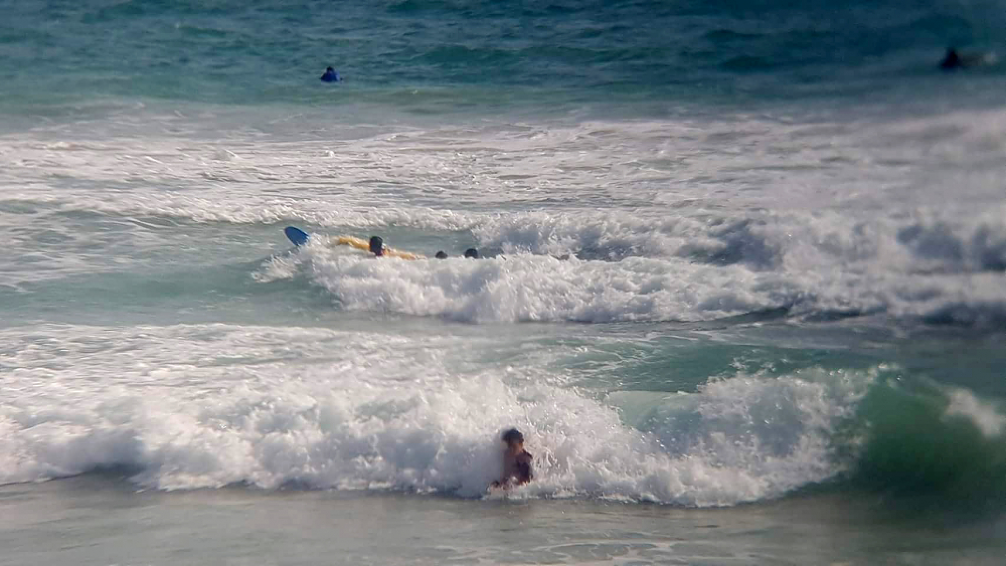 18 saved from Nai Harn surf