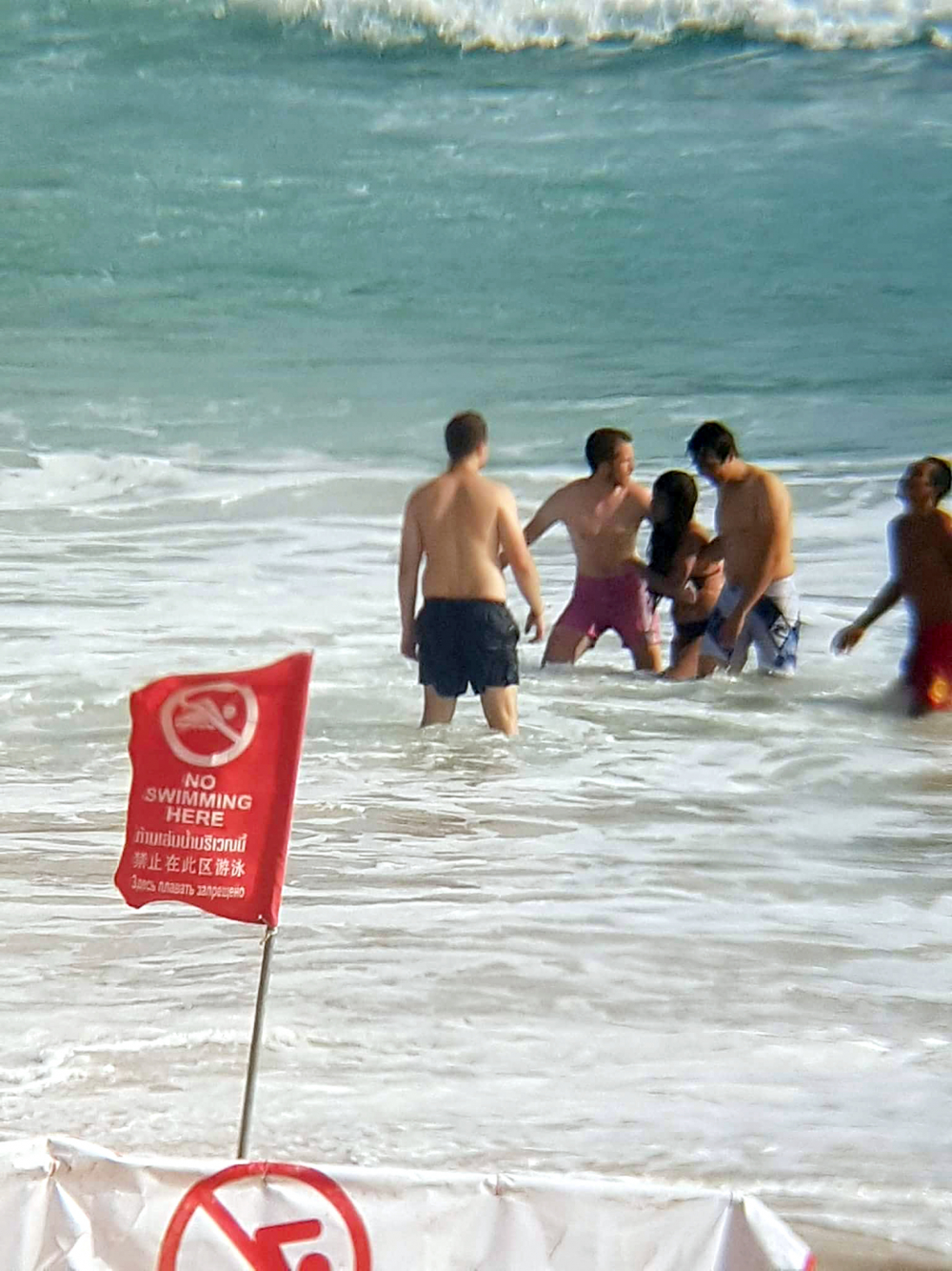 18 saved from Nai Harn surf