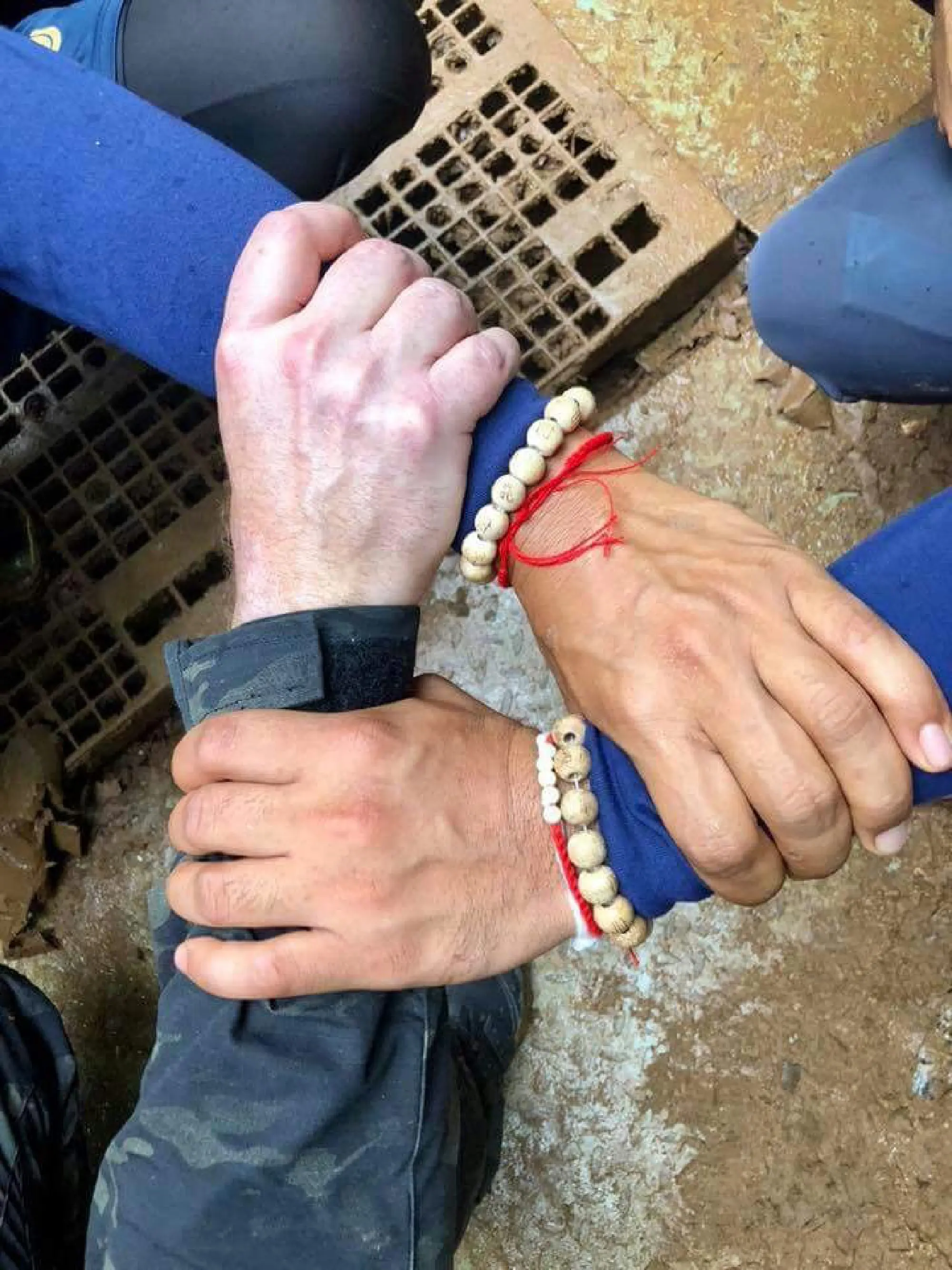 Boys emerge from cave