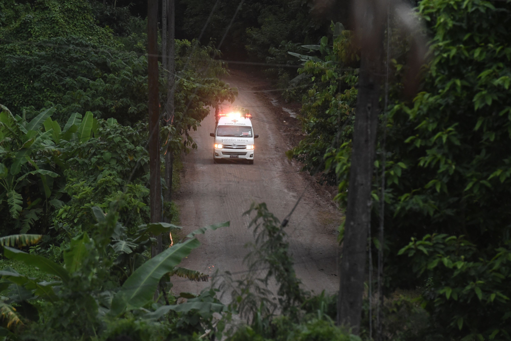 Boys emerge from cave