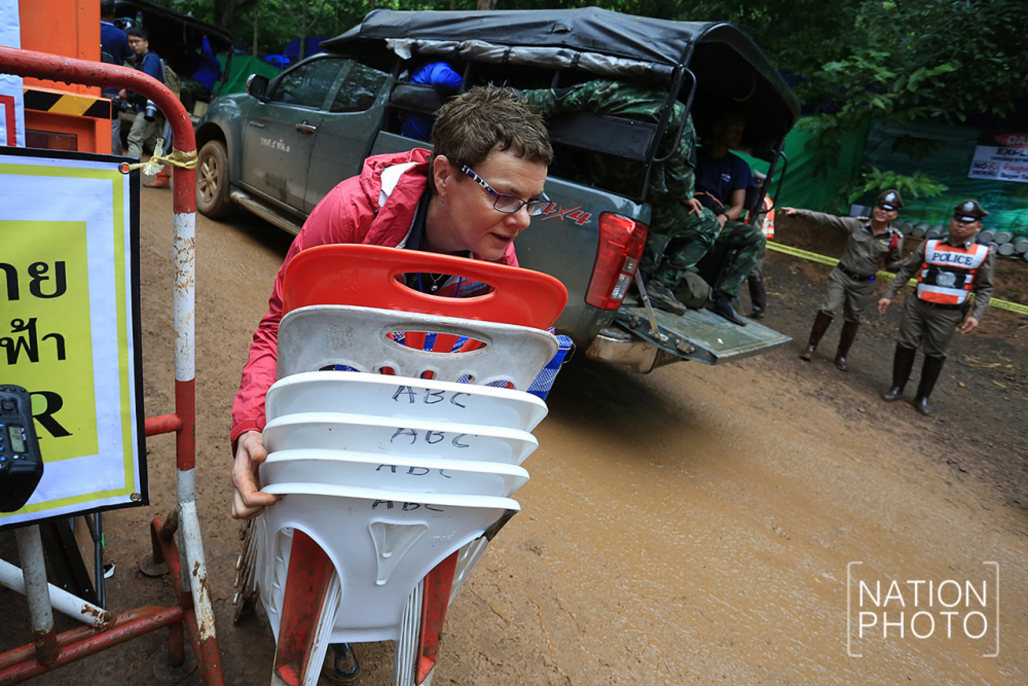 World media moved back from cave as evacuation begins