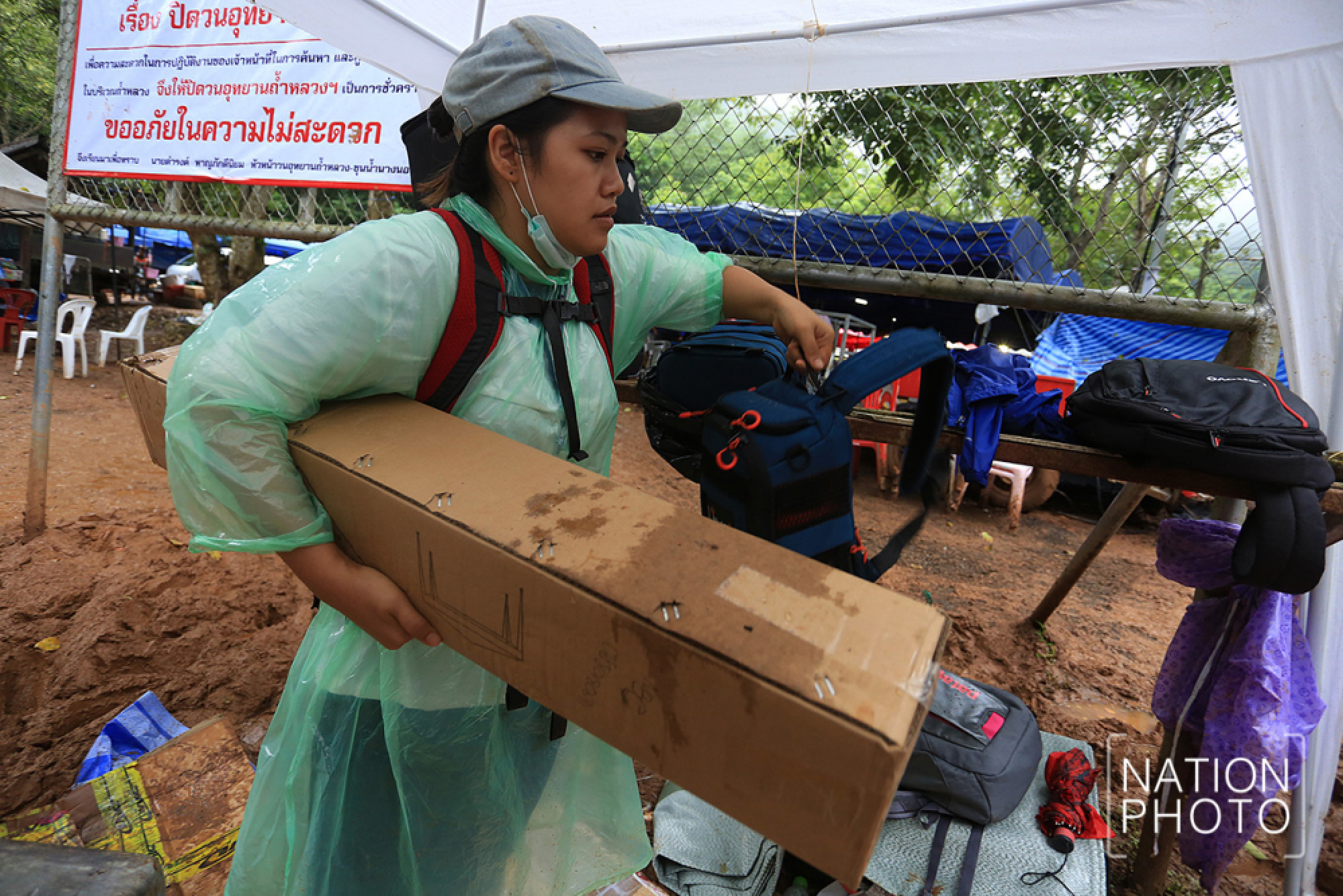World media moved back from cave as evacuation begins