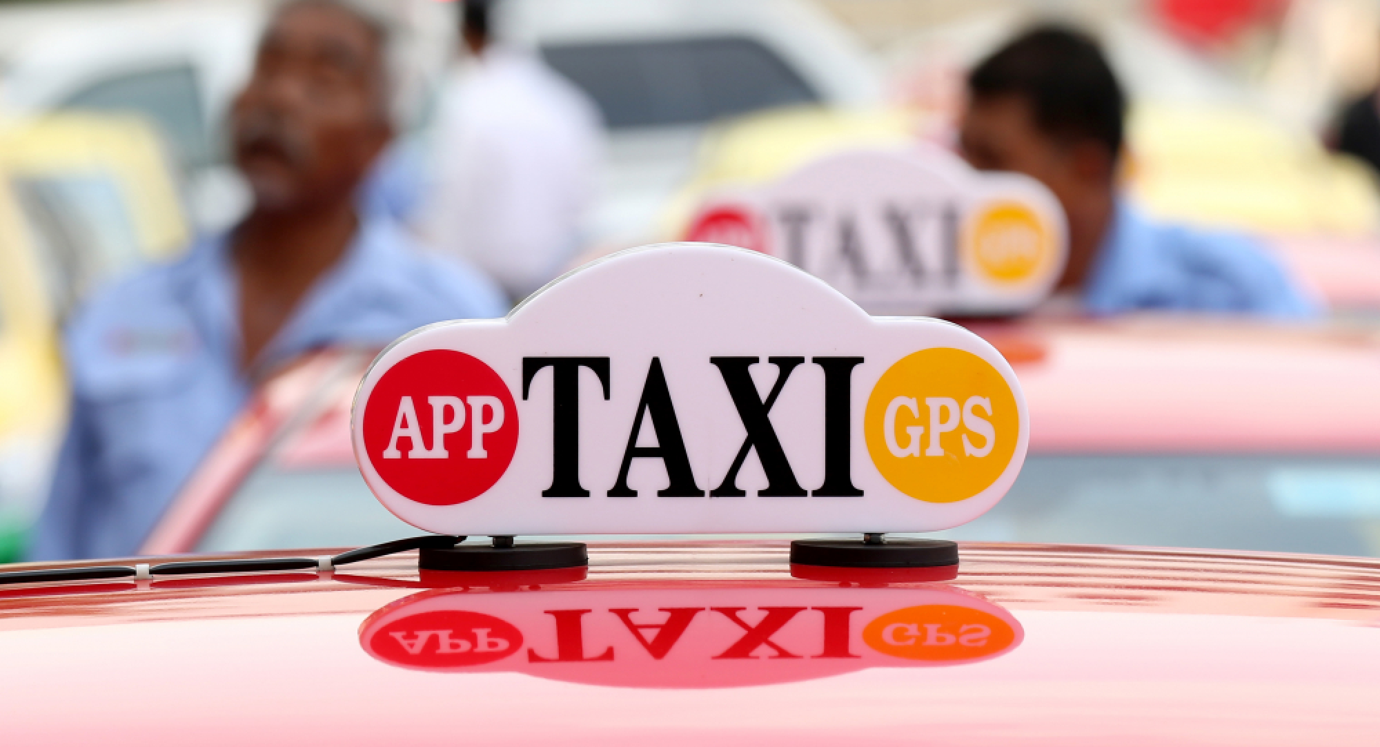 Report recommends taxi fare increases, strict regulation of rideshare companies