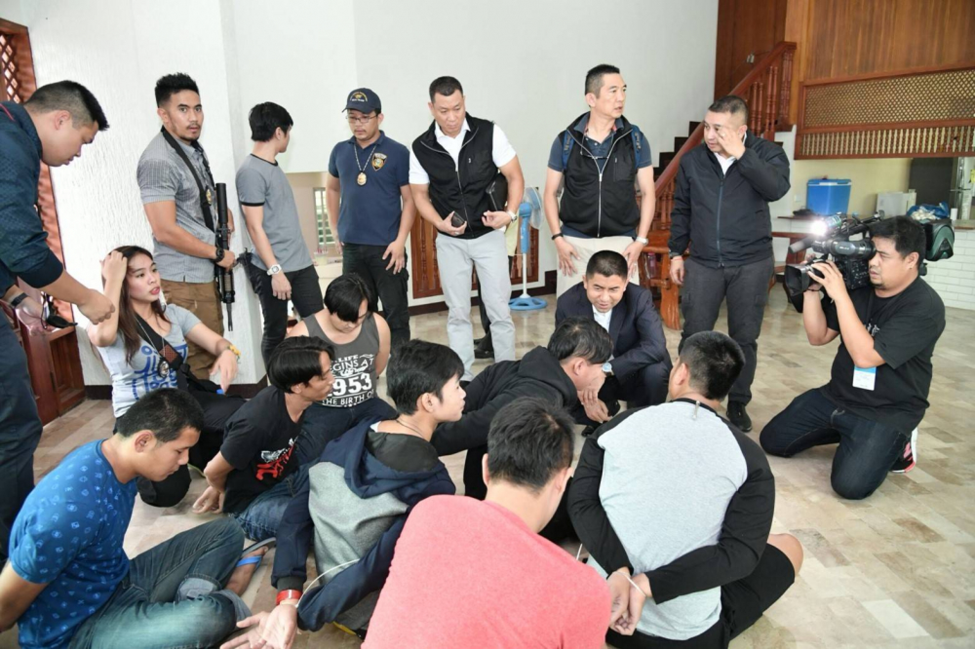 Thai, Philippine police crack down on call centre gang in Manila