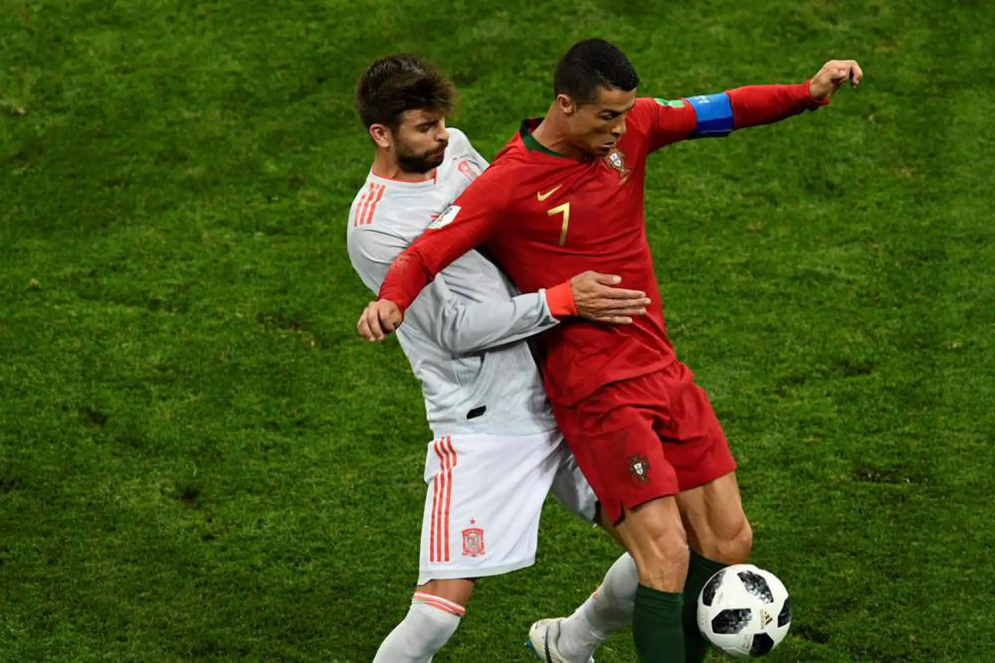 Ronaldo hat-trick steals the show as Portugal and Spain draw classic