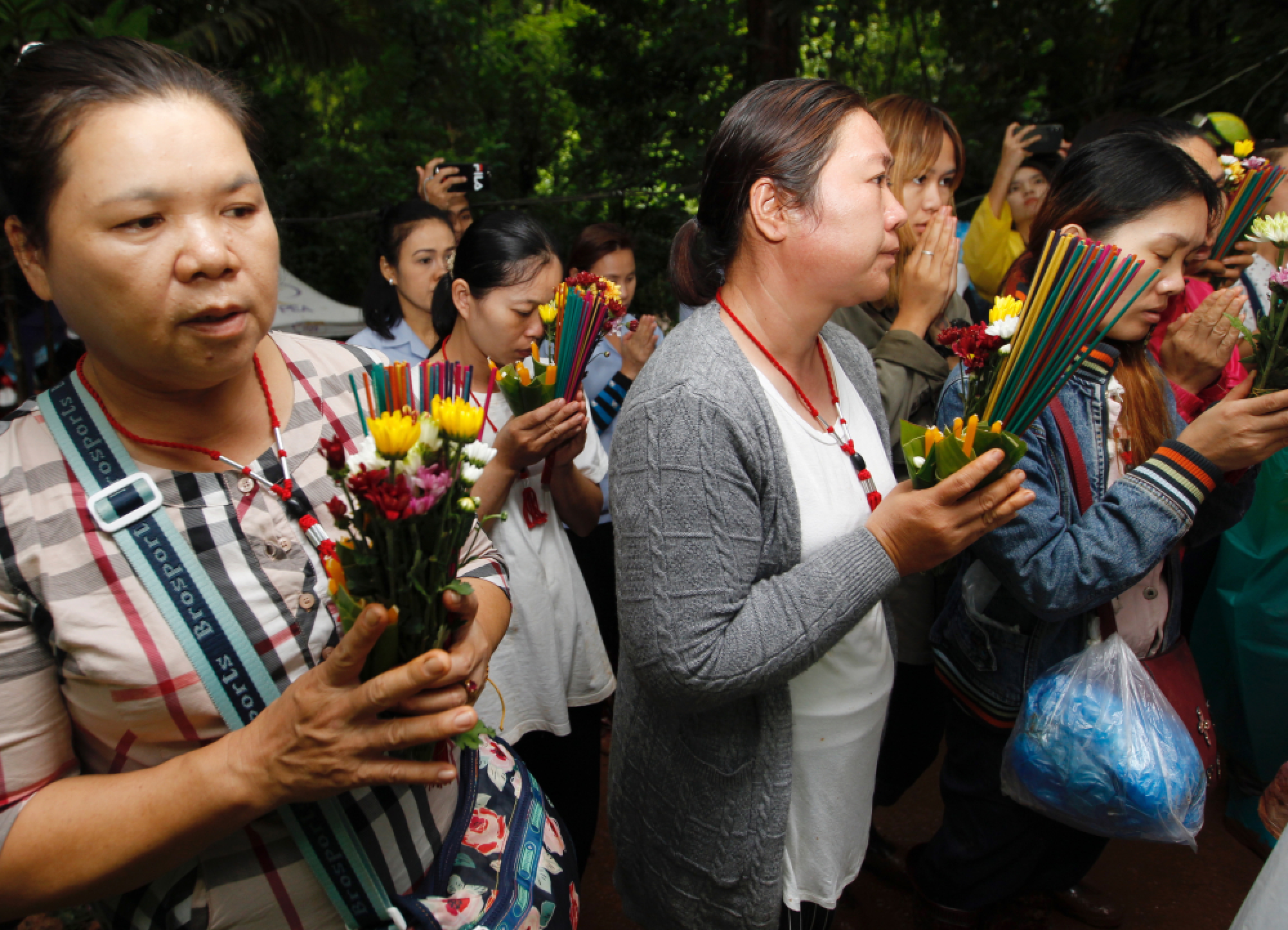 Prayers for Thai children and coach trapped in flooded cave