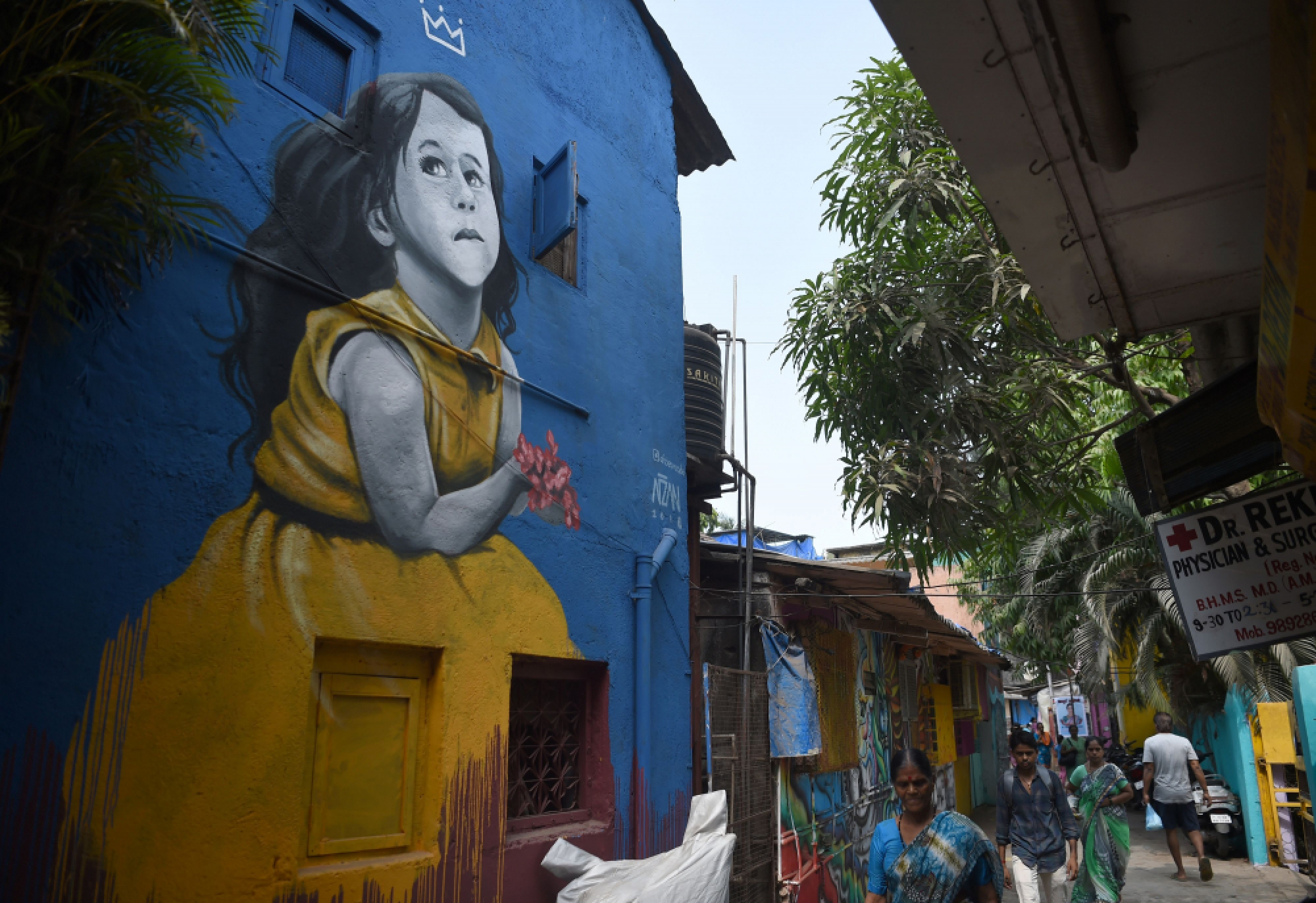Colour sweeps through Mumbai slums