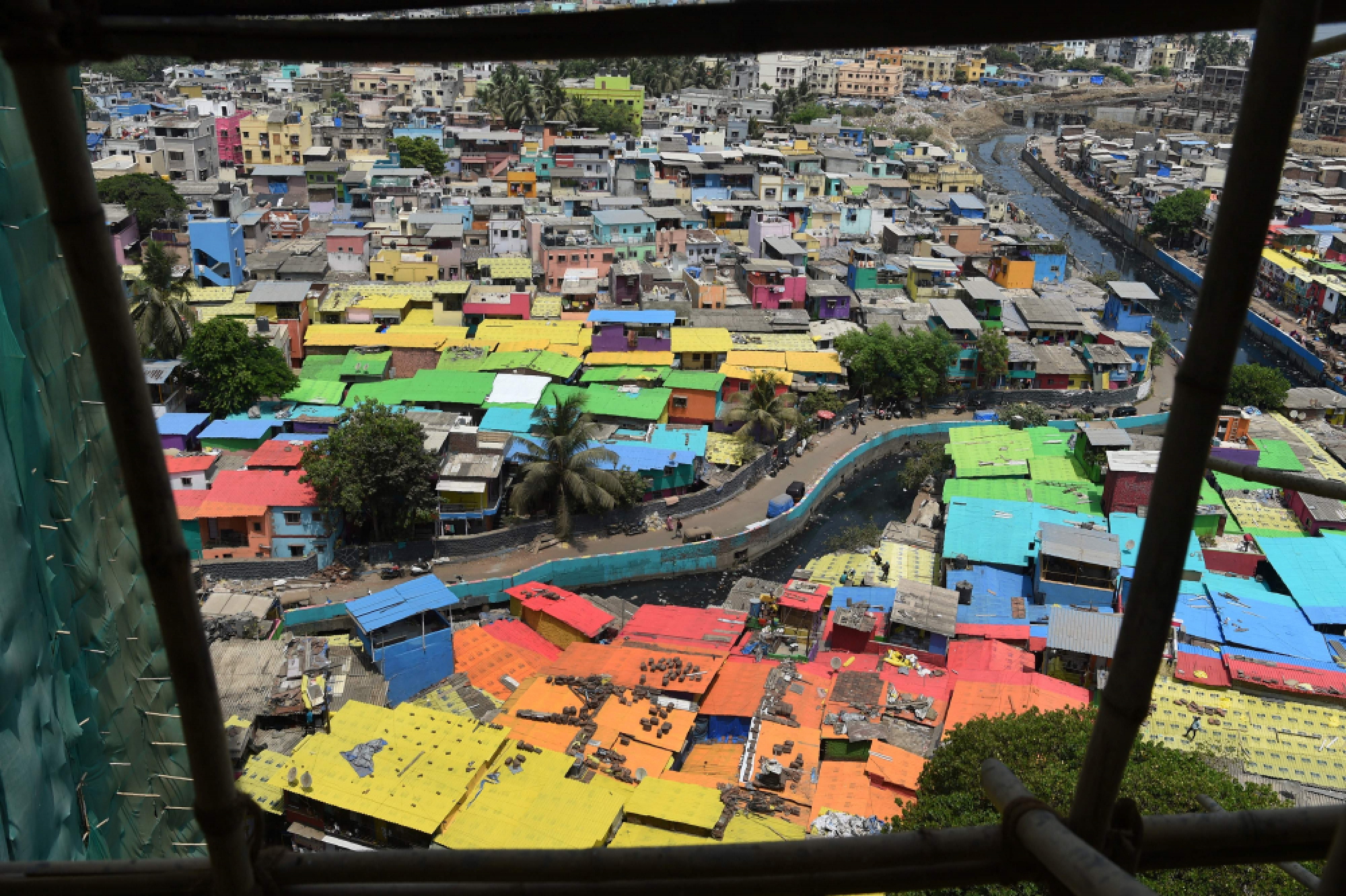 Colour sweeps through Mumbai slums
