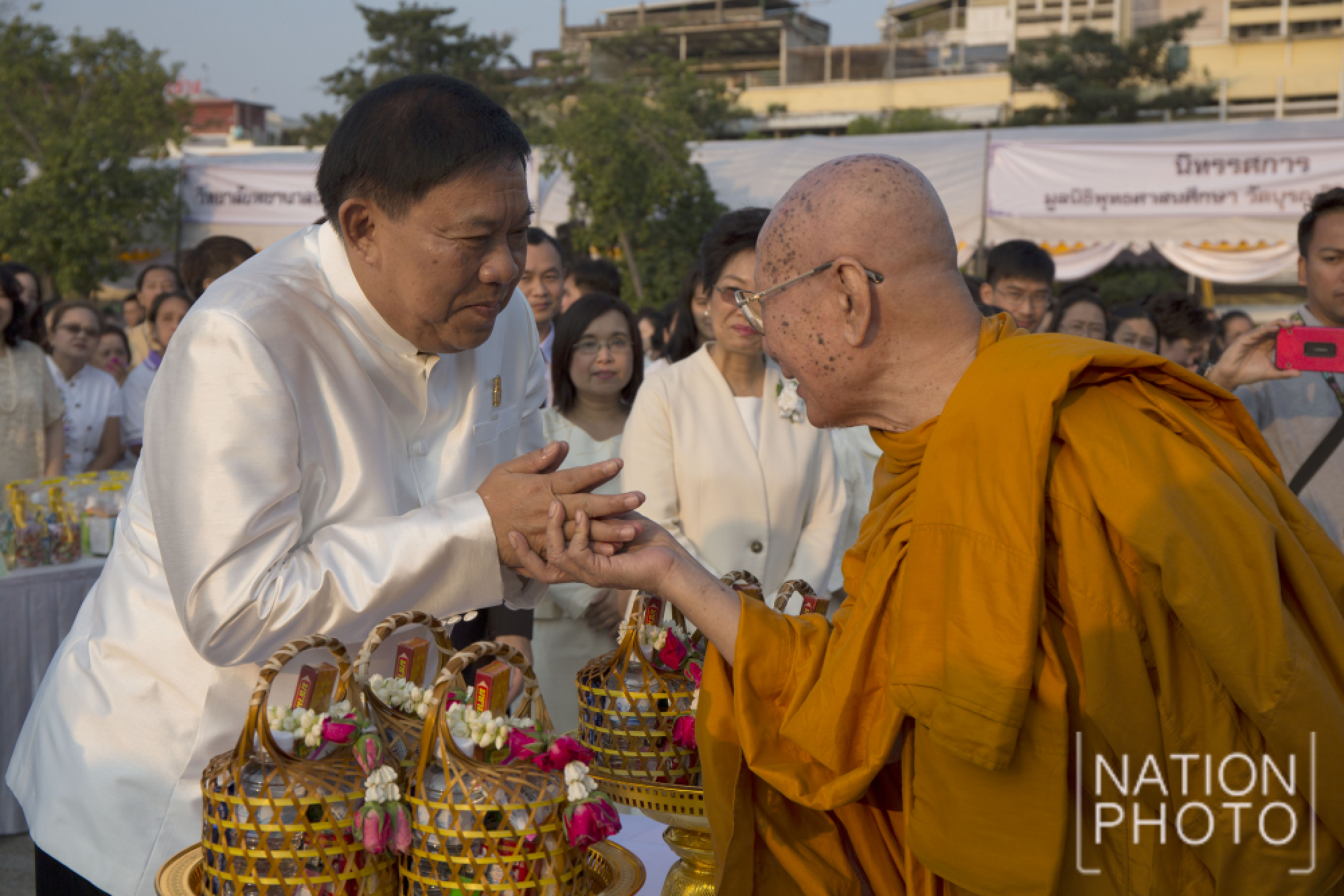 Makha Puja Day merit dedicated to the King