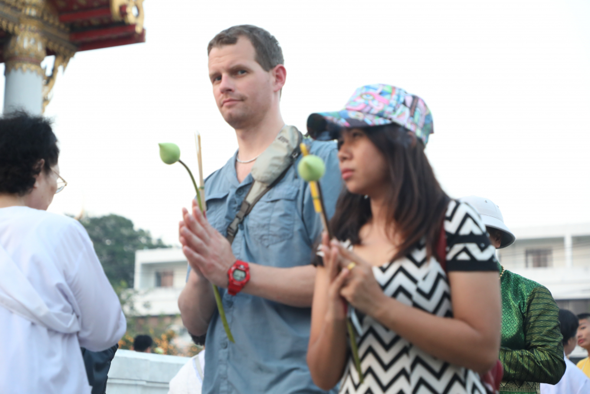 Buddhists take part in a candle-lit circumambulation ceremony to mark Makha Bucha Day