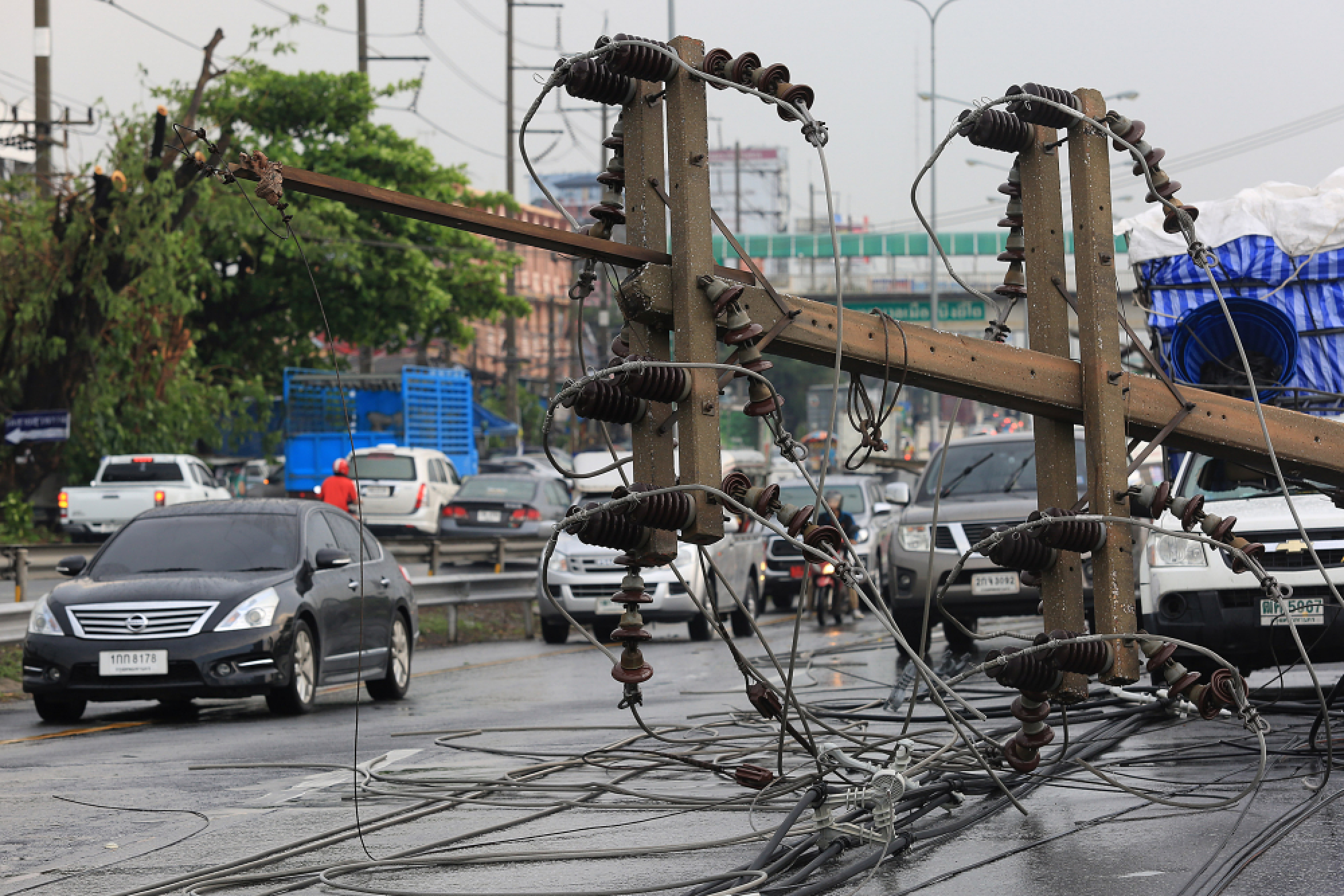 Falling Poles amid Rainstorm