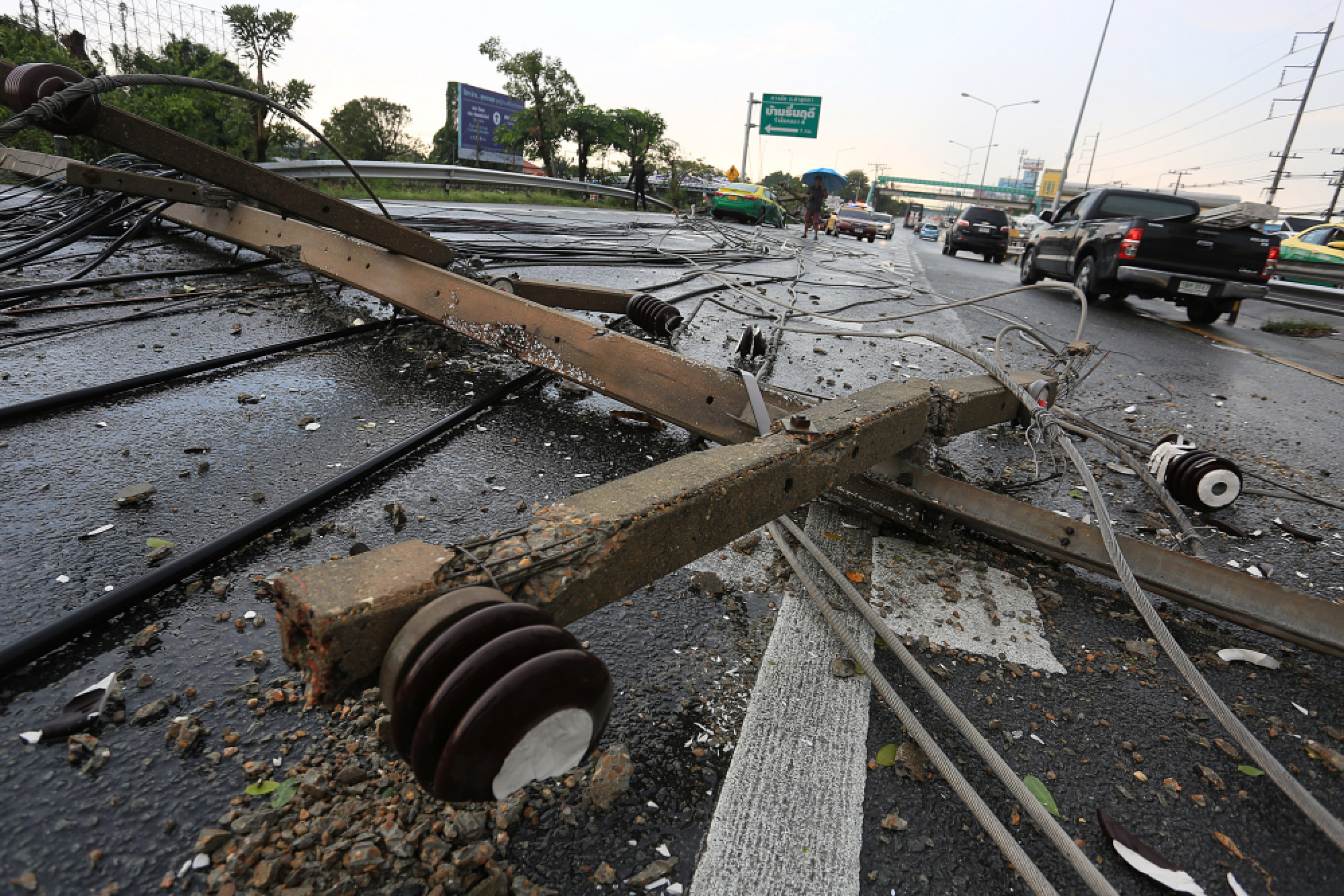Falling Poles amid Rainstorm