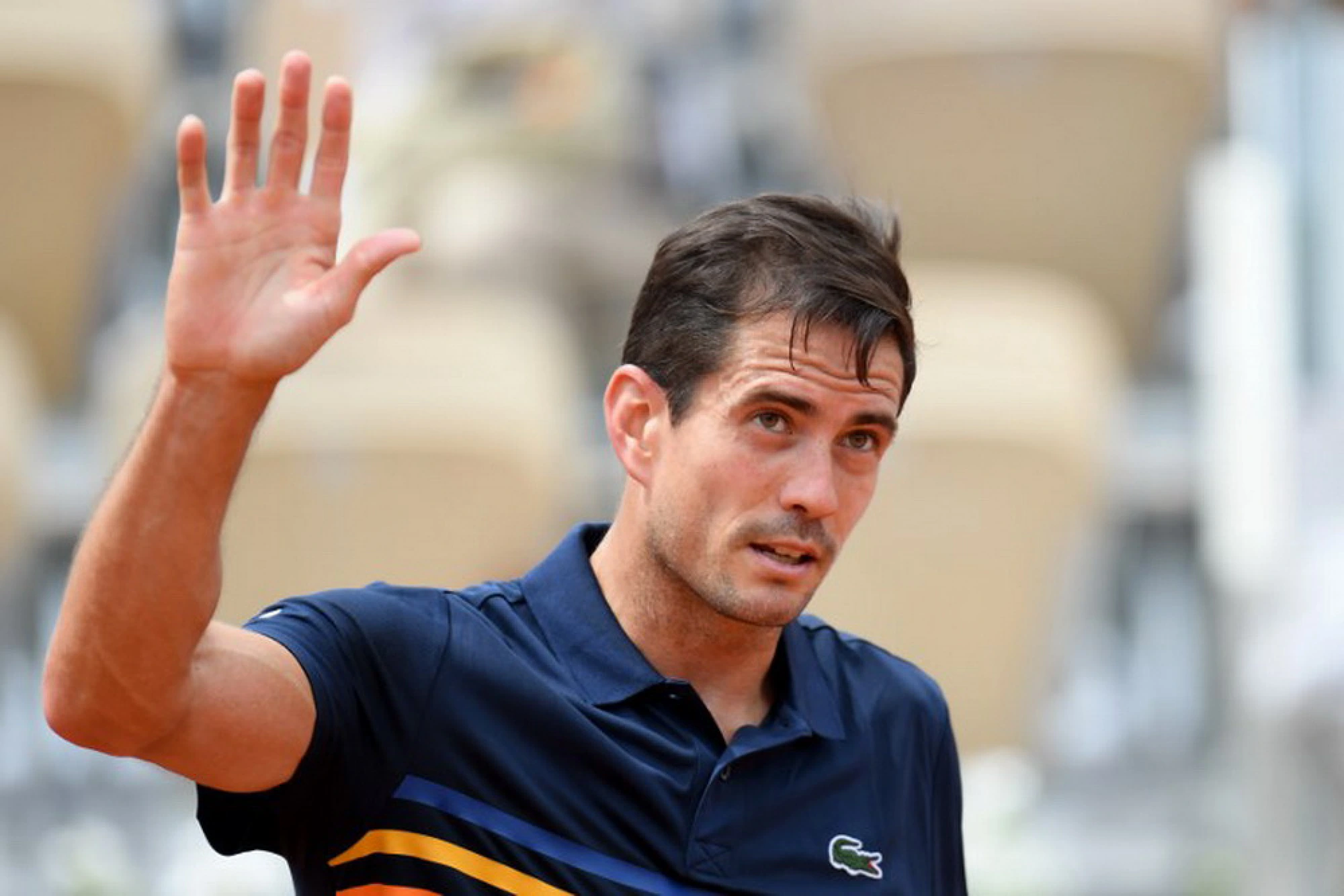 Wawrinka crashes out in Roland Garros first round, Djokovic through