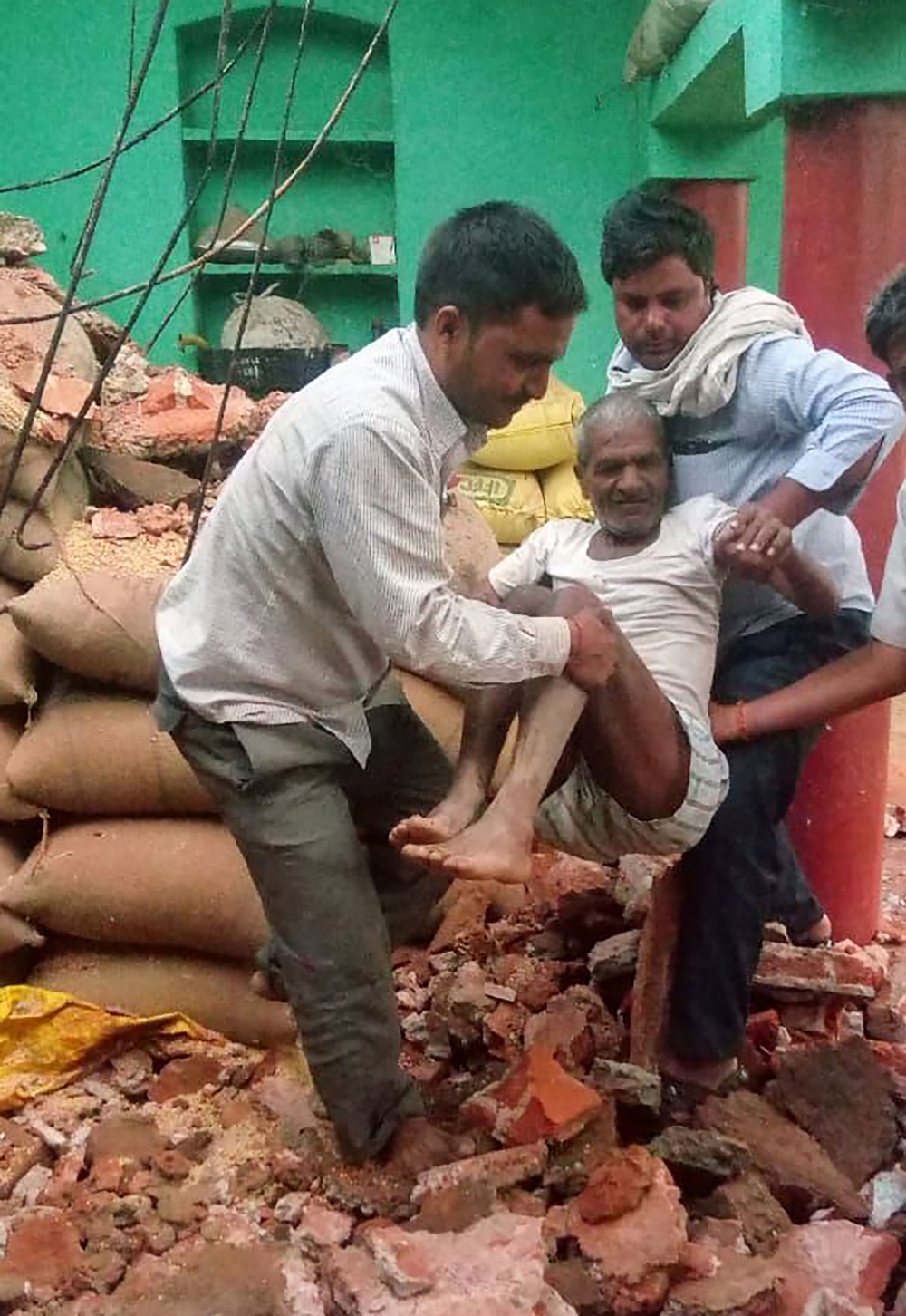 Death toll from north India storms jumps to 97