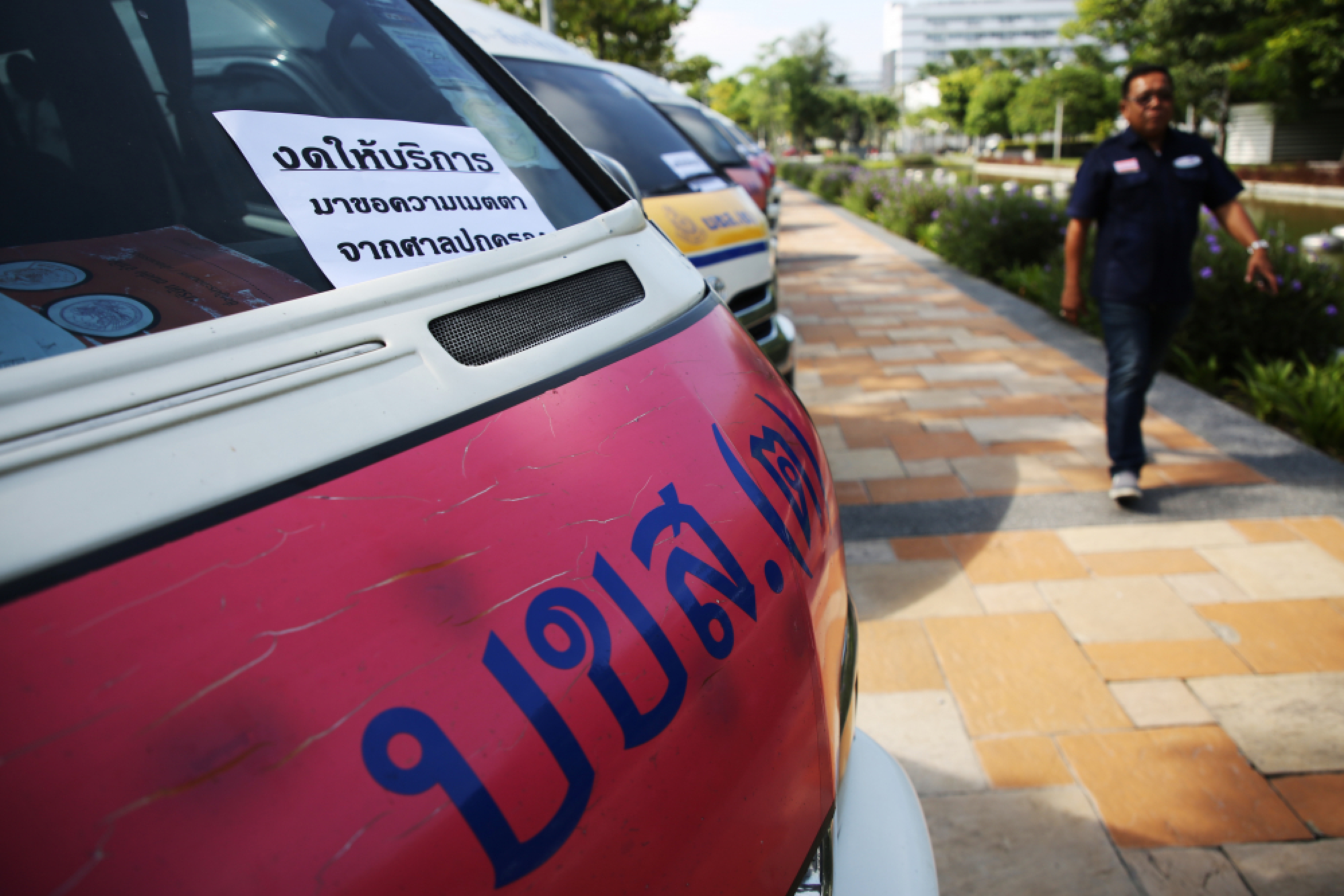 Protesters defiant as older vans forced off roads