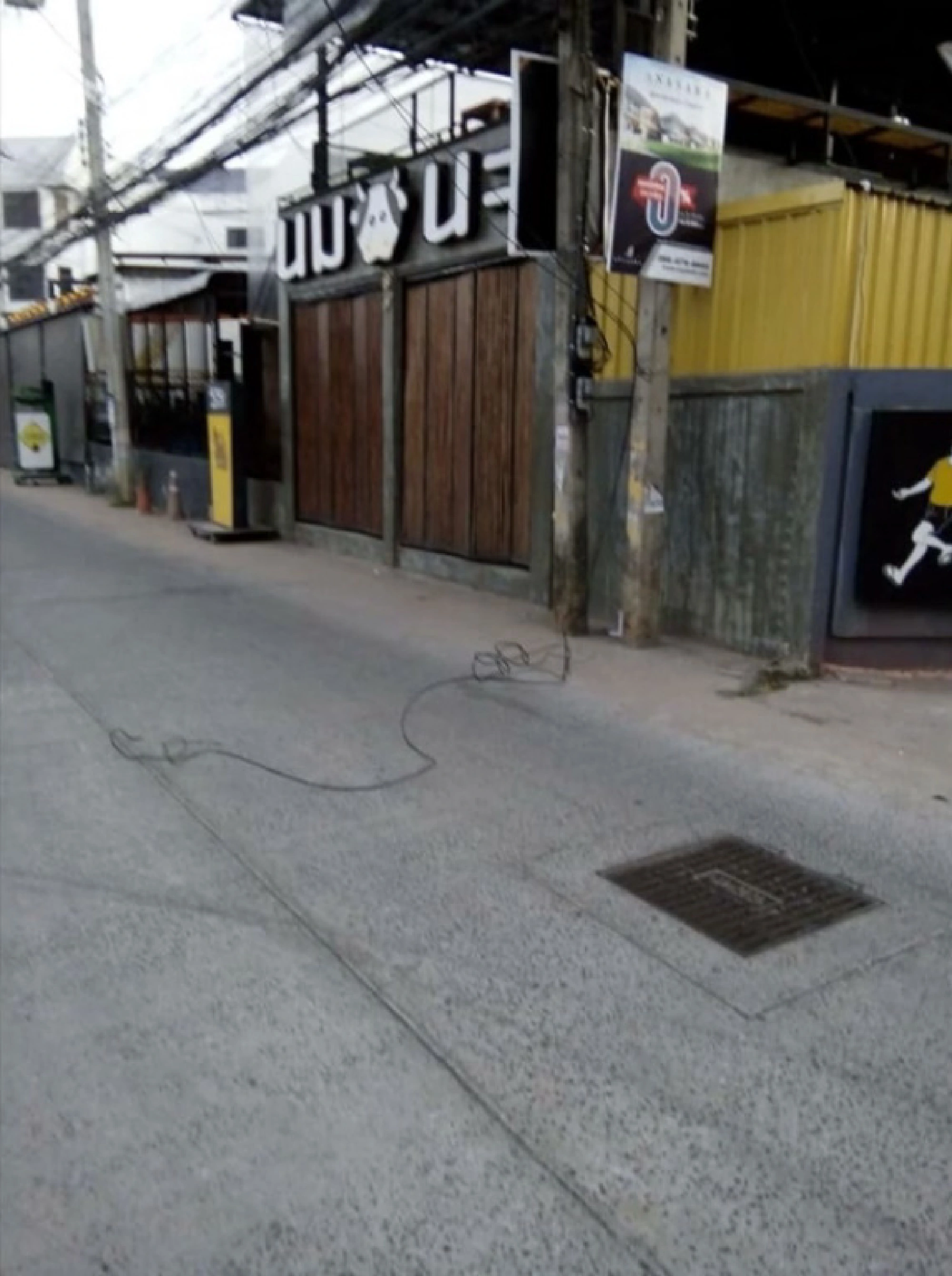 Two injured as hanging fibre-optic cable catches motorcyclist's neck