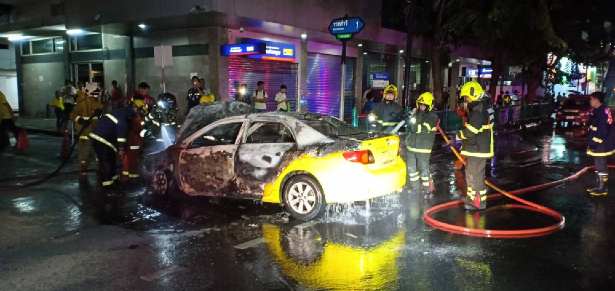No fare after fire: Passenger flees blazing Bangkok taxi