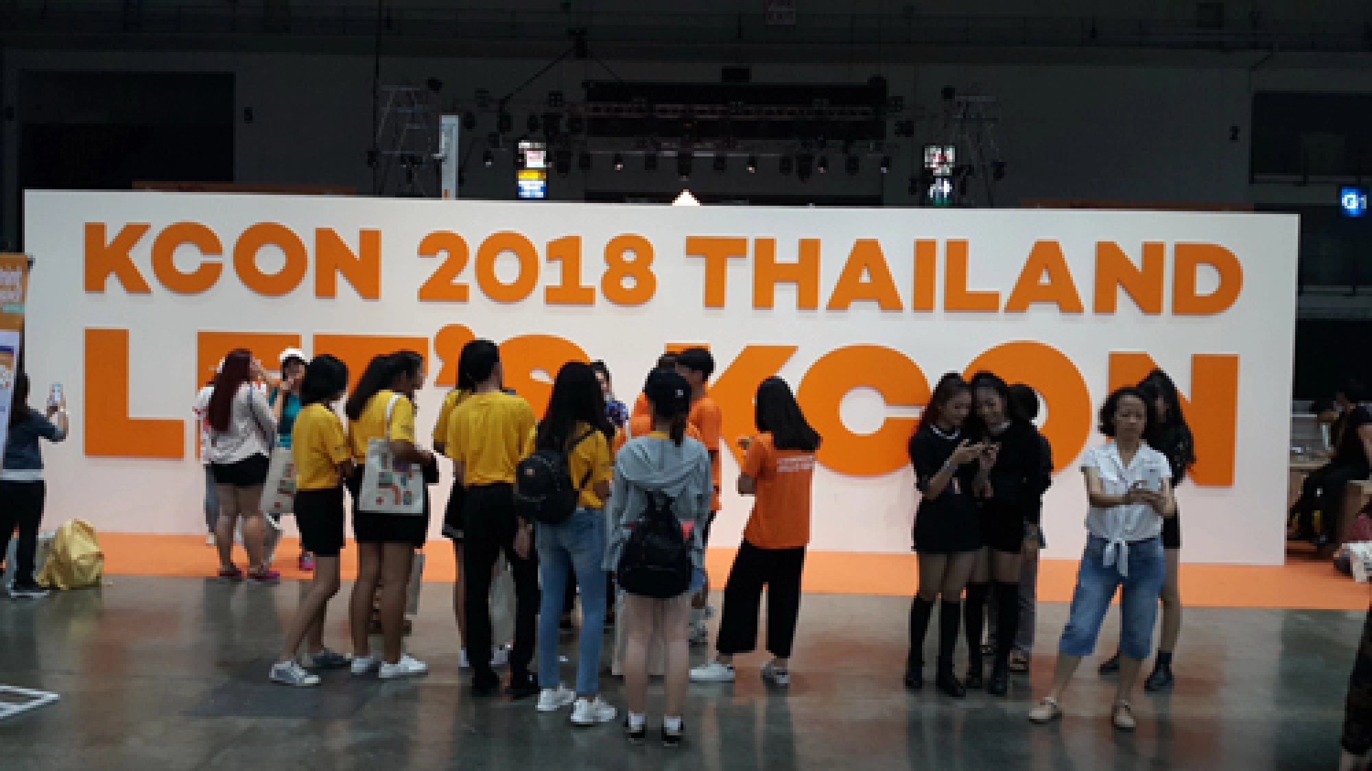 K-pop onstage, girls in puddles