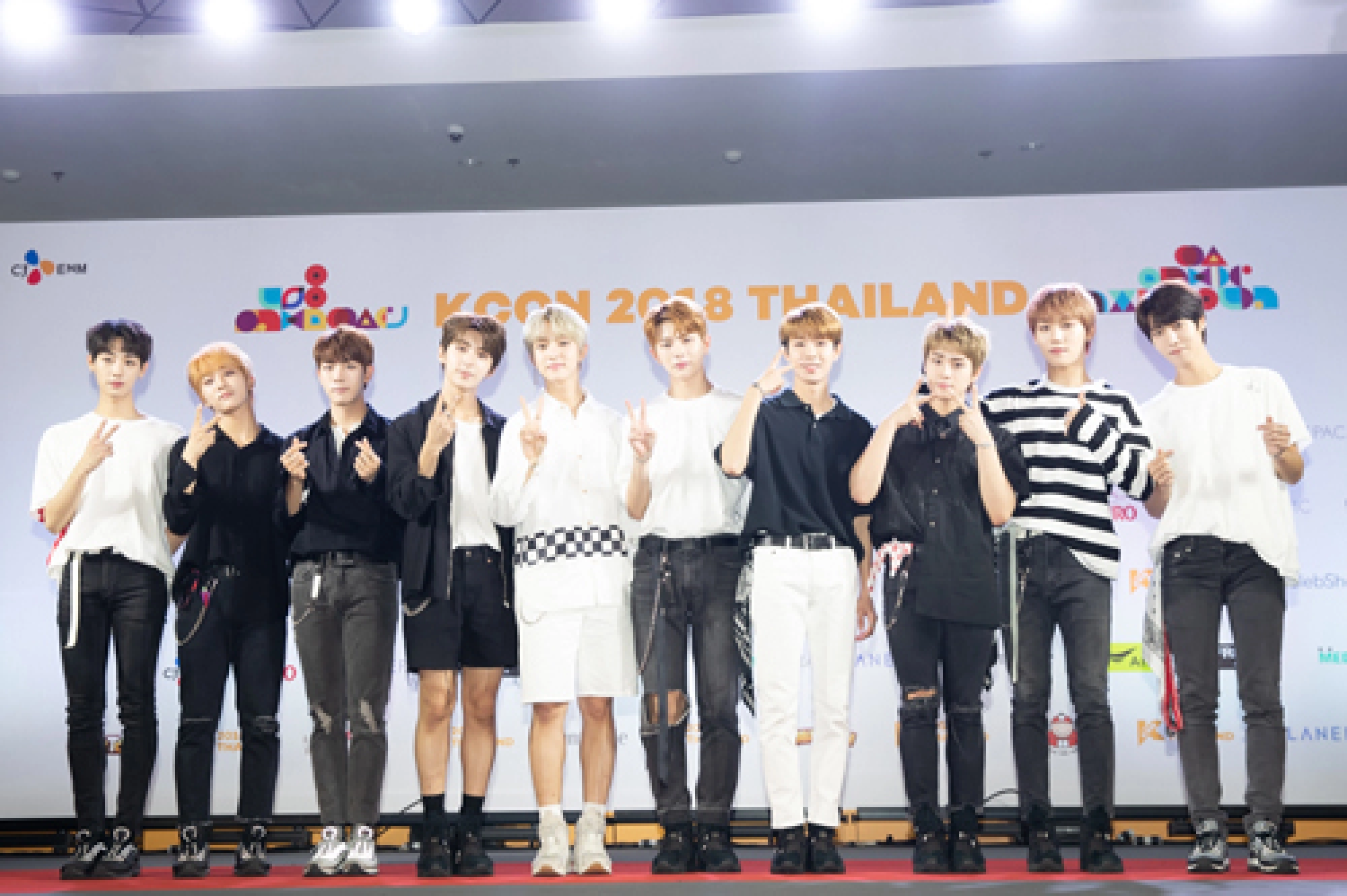 K-pop onstage, girls in puddles