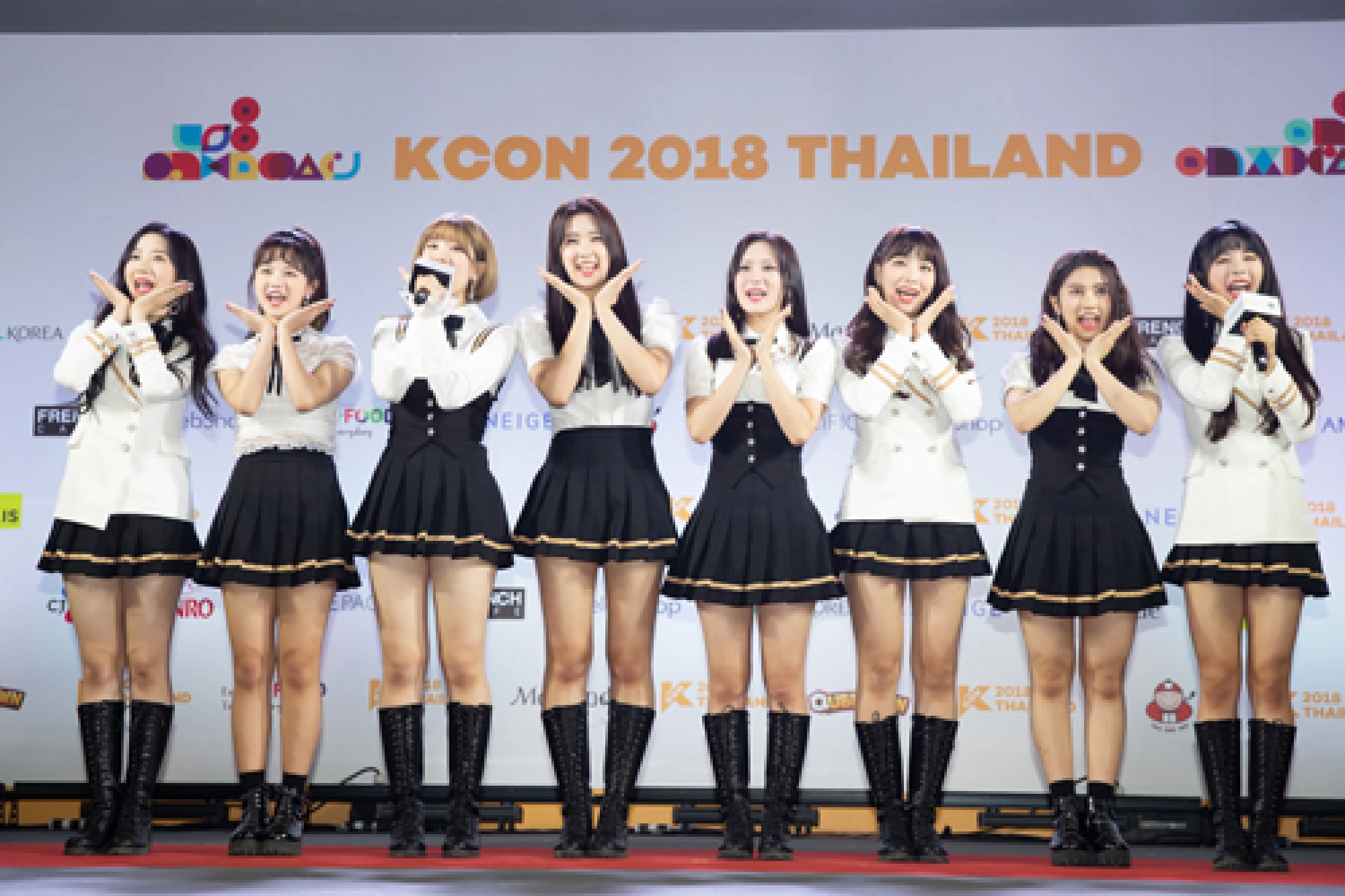 K-pop onstage, girls in puddles