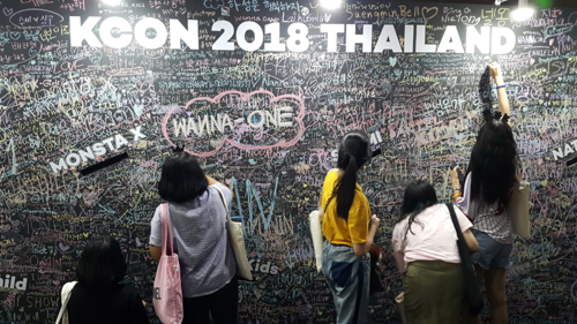 K-pop onstage, girls in puddles